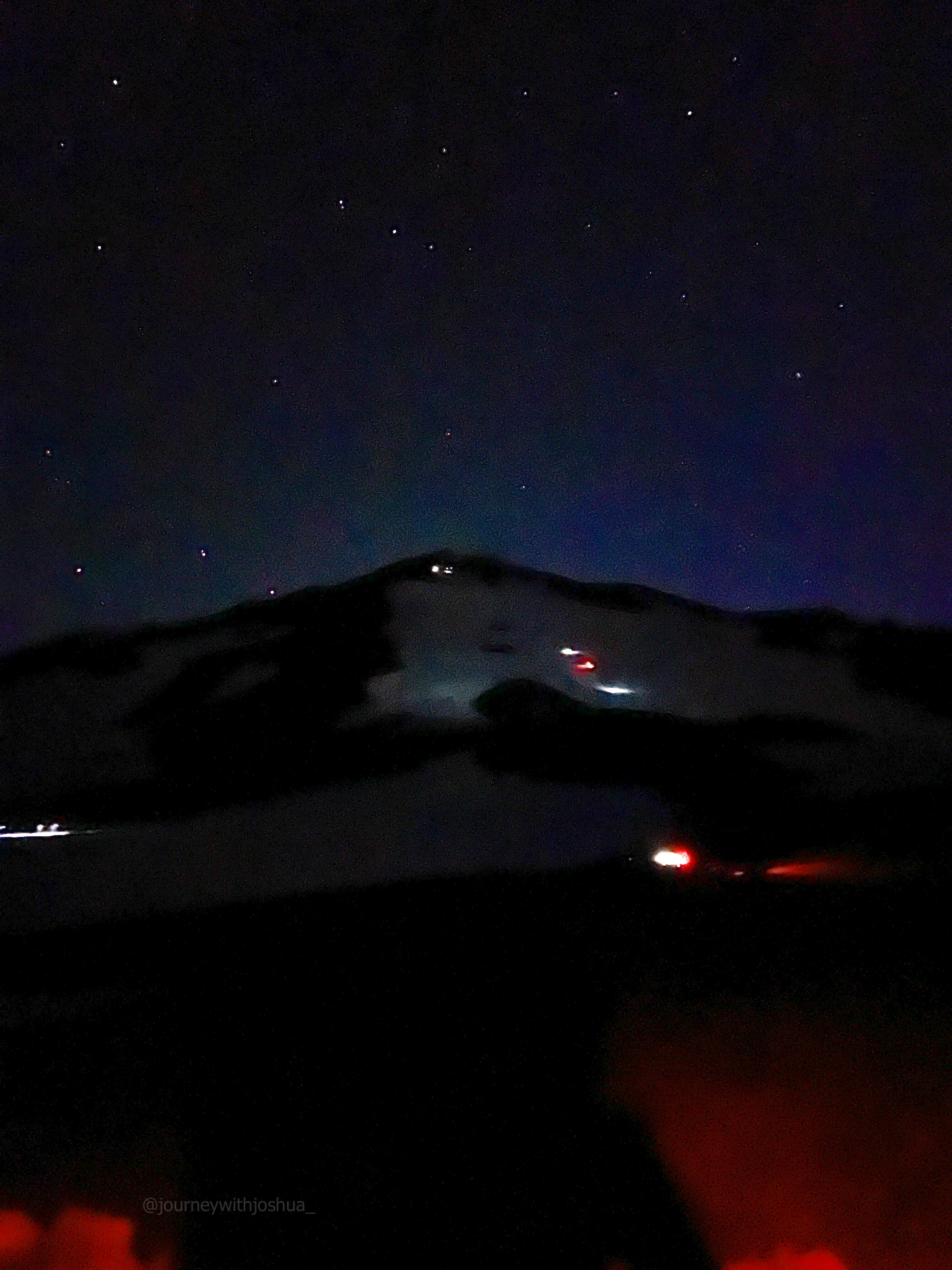 Headlamps already lined up and climbing in the pre-dawn dark on Mount Adams