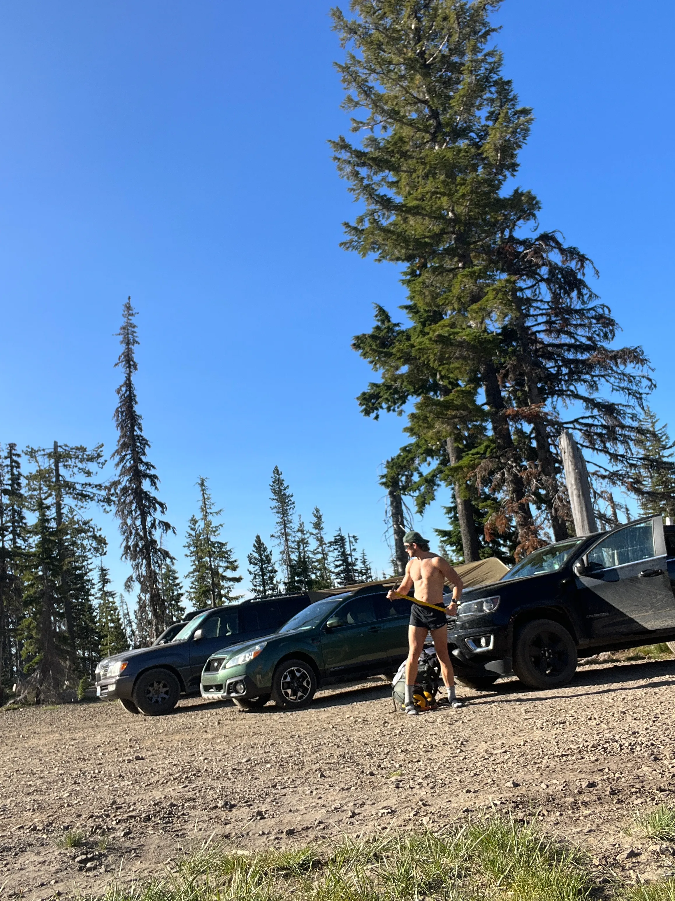 Me packing up and getting some quick sun at the campsite