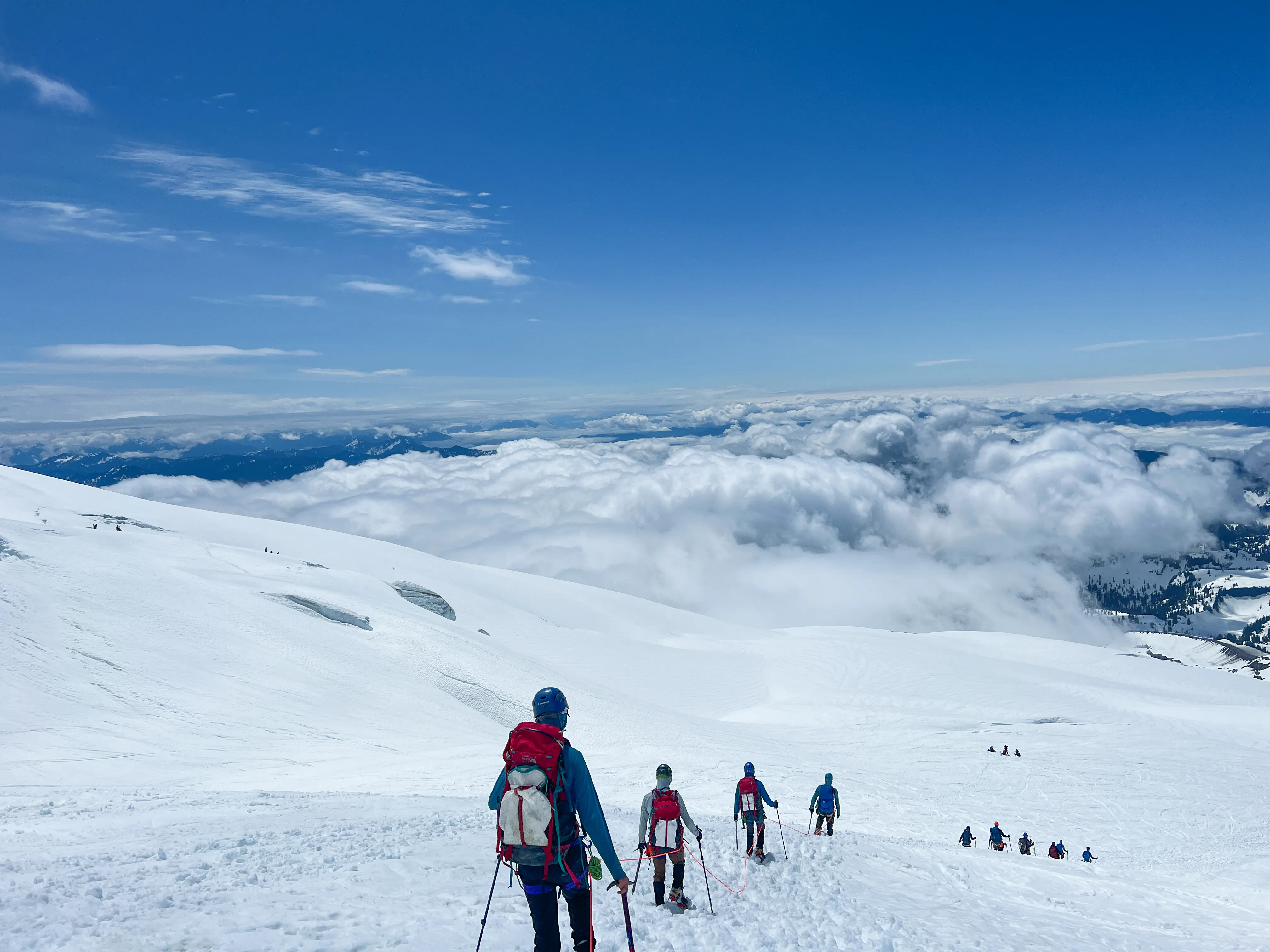 Plunging back down the glacier toward high camp through the clouds