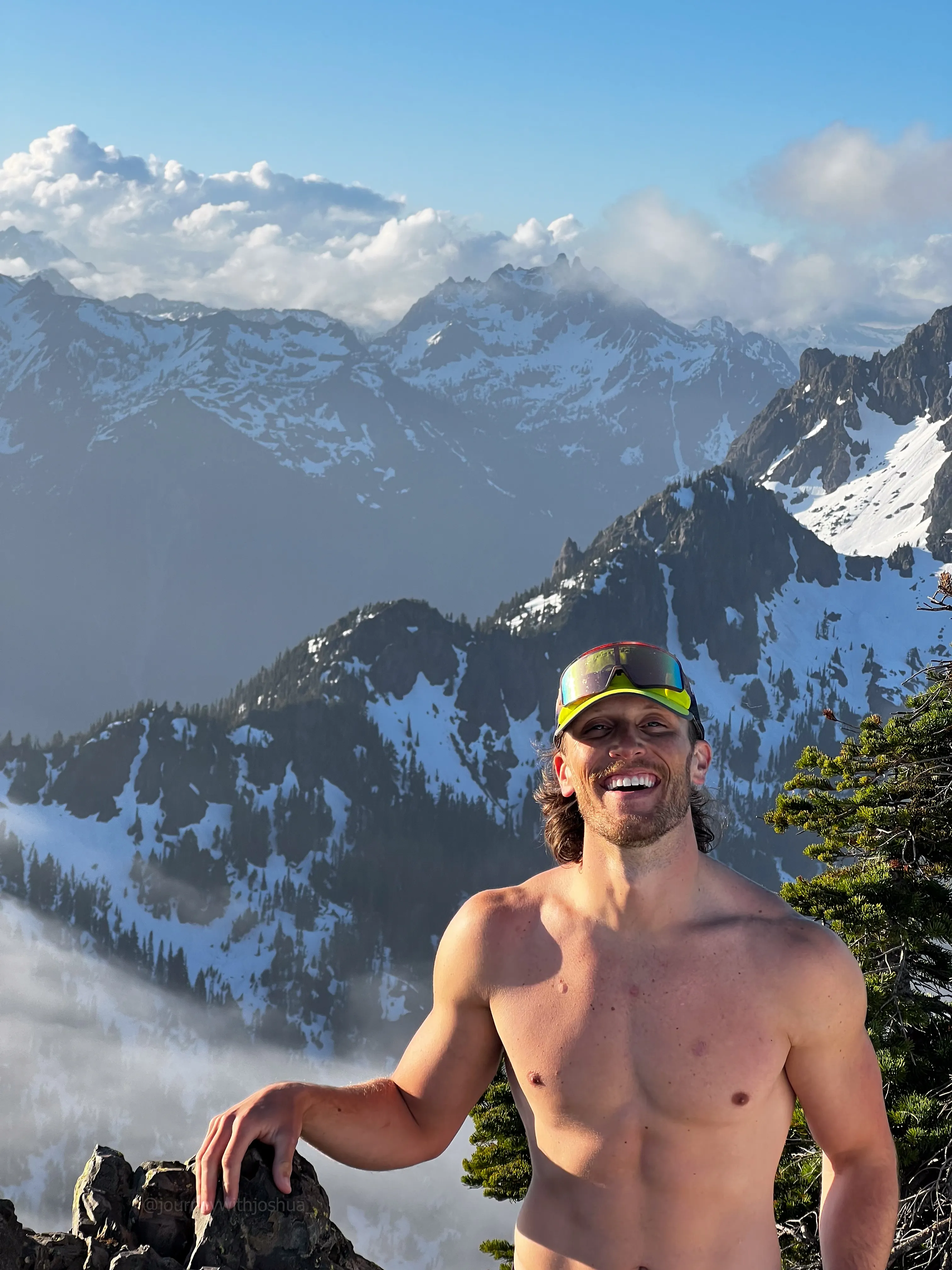 Joshua on the summit of Mount Ellinor, shot from a distance