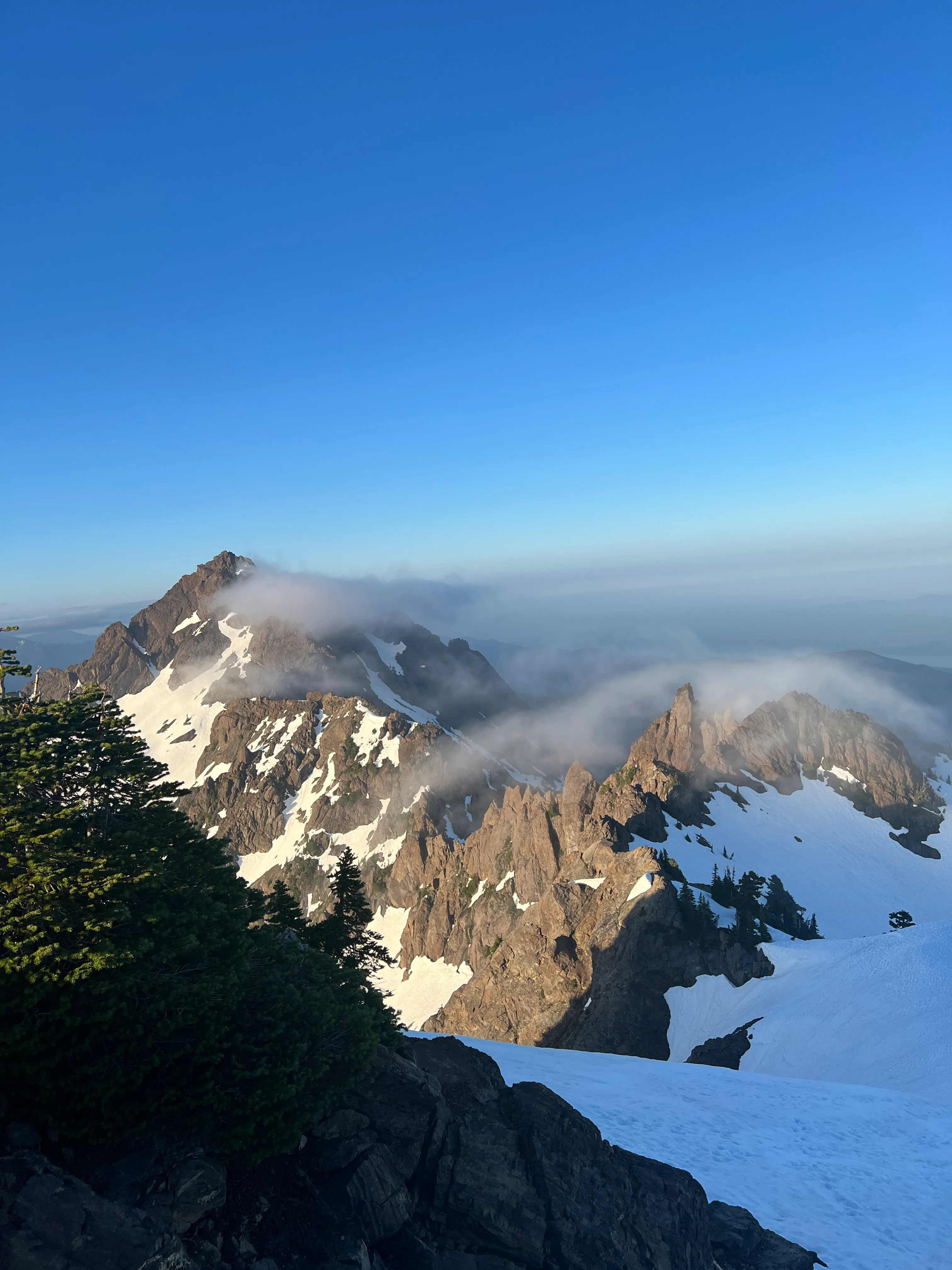 Fog and sunset light over the Olympic Range