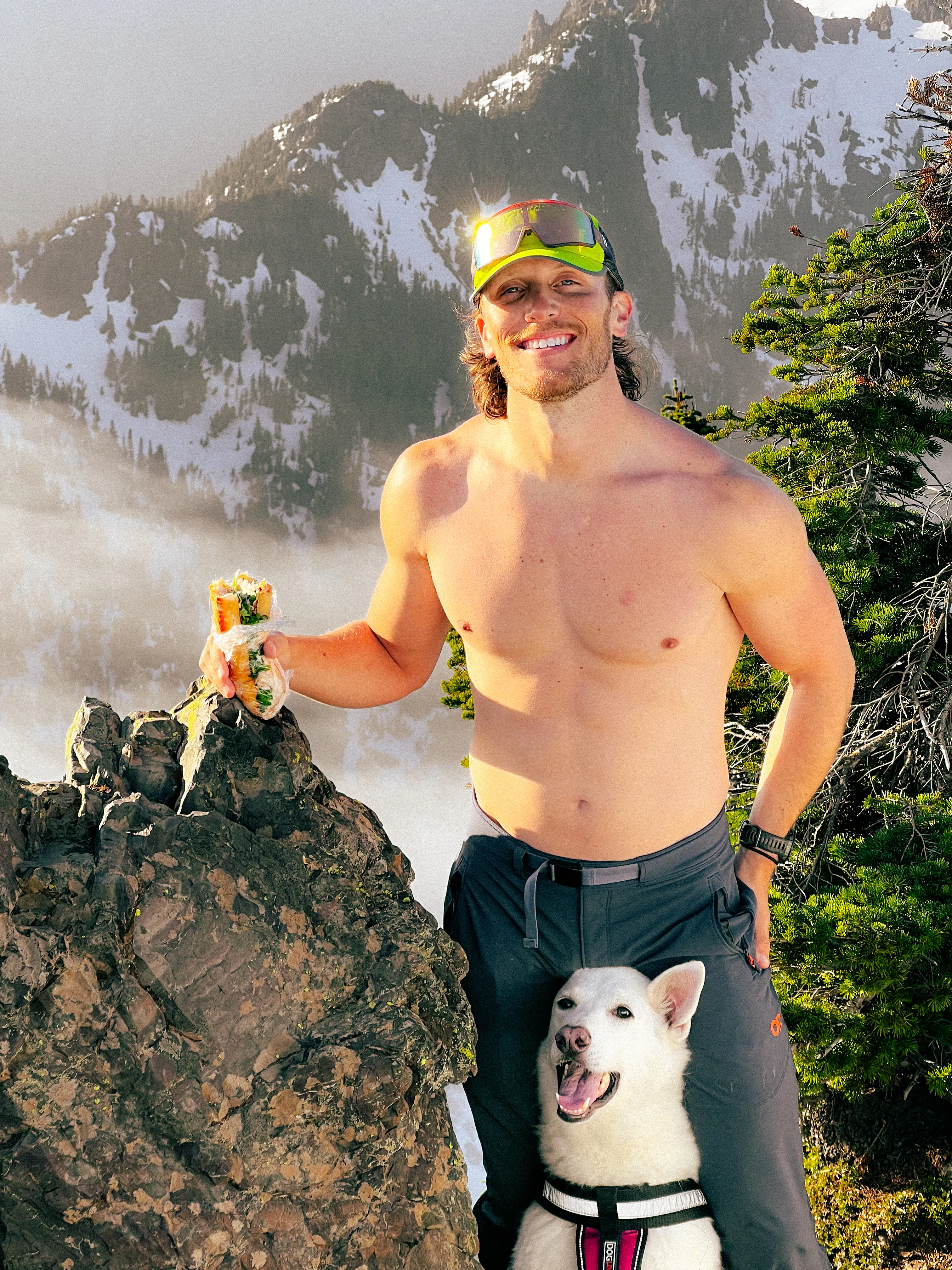 Joshua and Stella the dog on the summit of Mount Ellinor, telephoto compression.