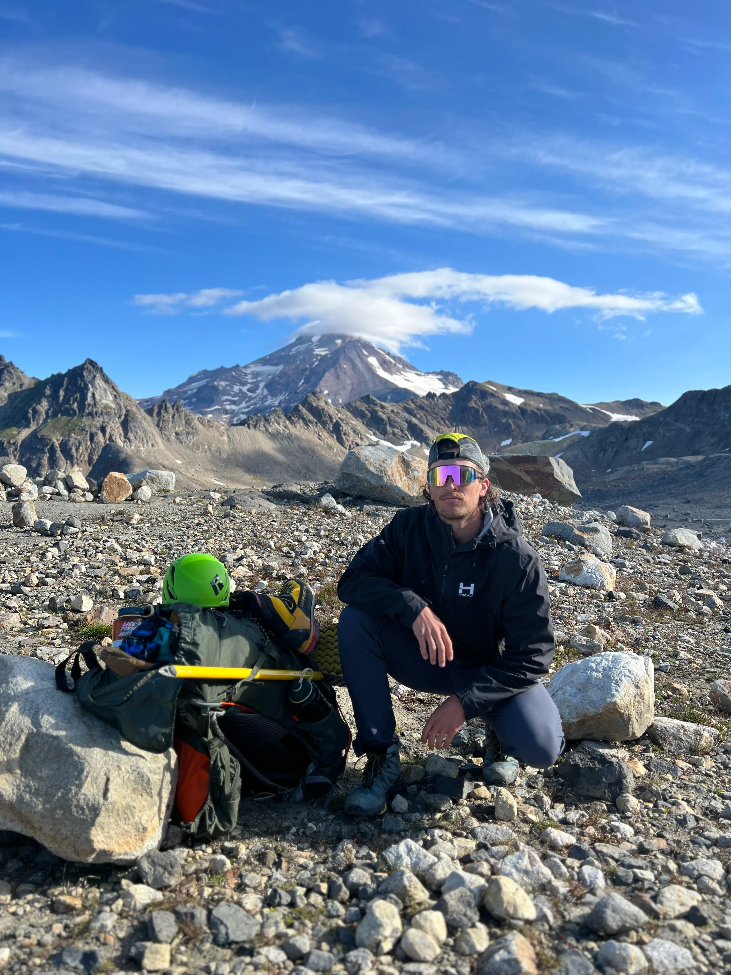 Striking a quick aesthetic pose at camp with Glacier Peak behind