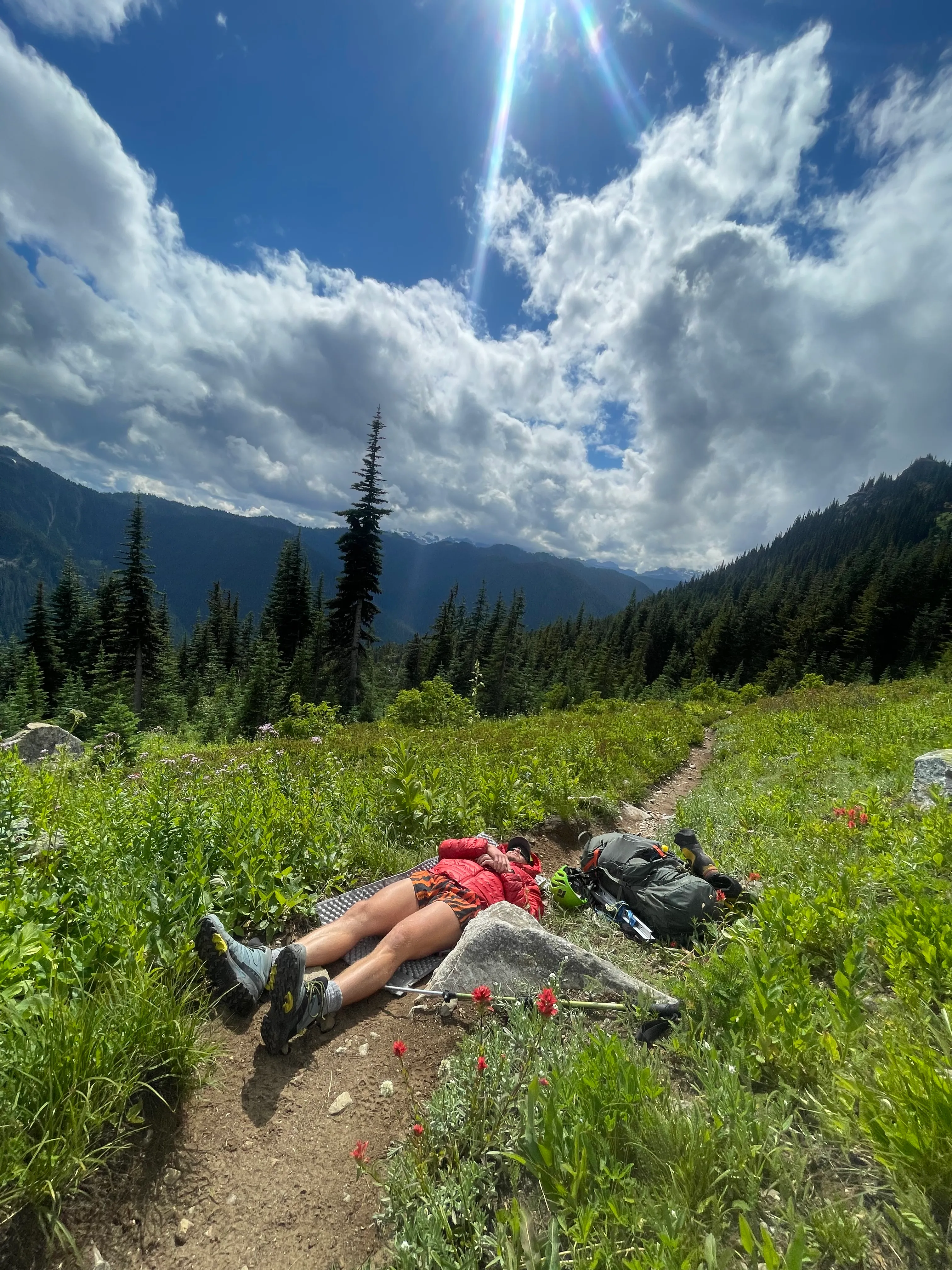 Taking a dirtnap on the trail above the switchbacks