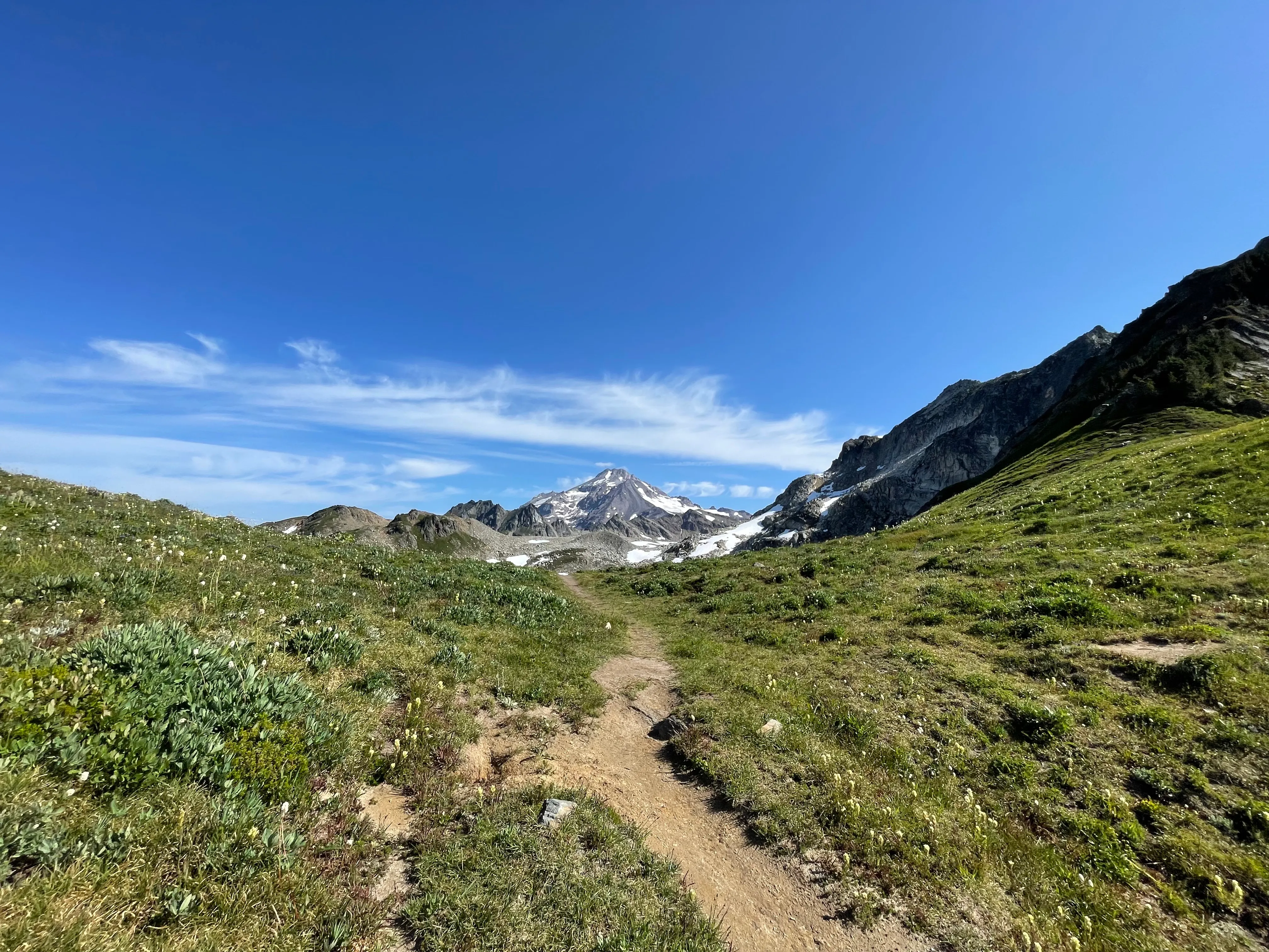 The first full view of Glacier Peak, known as Dakobed to the Sauk-Suiattle people