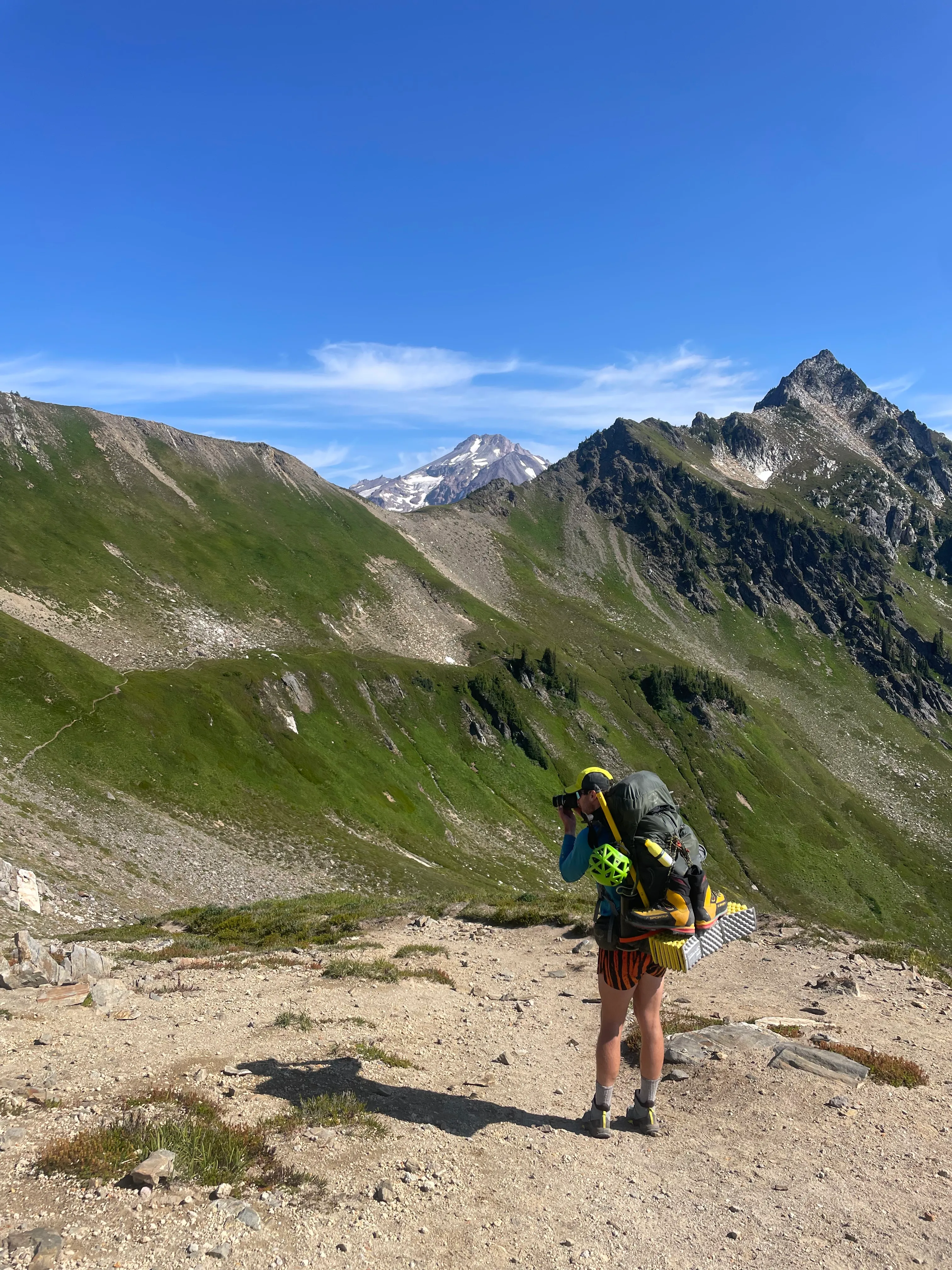 Just the tip of Glacier Peak poking out over the ridge, the first glimpse