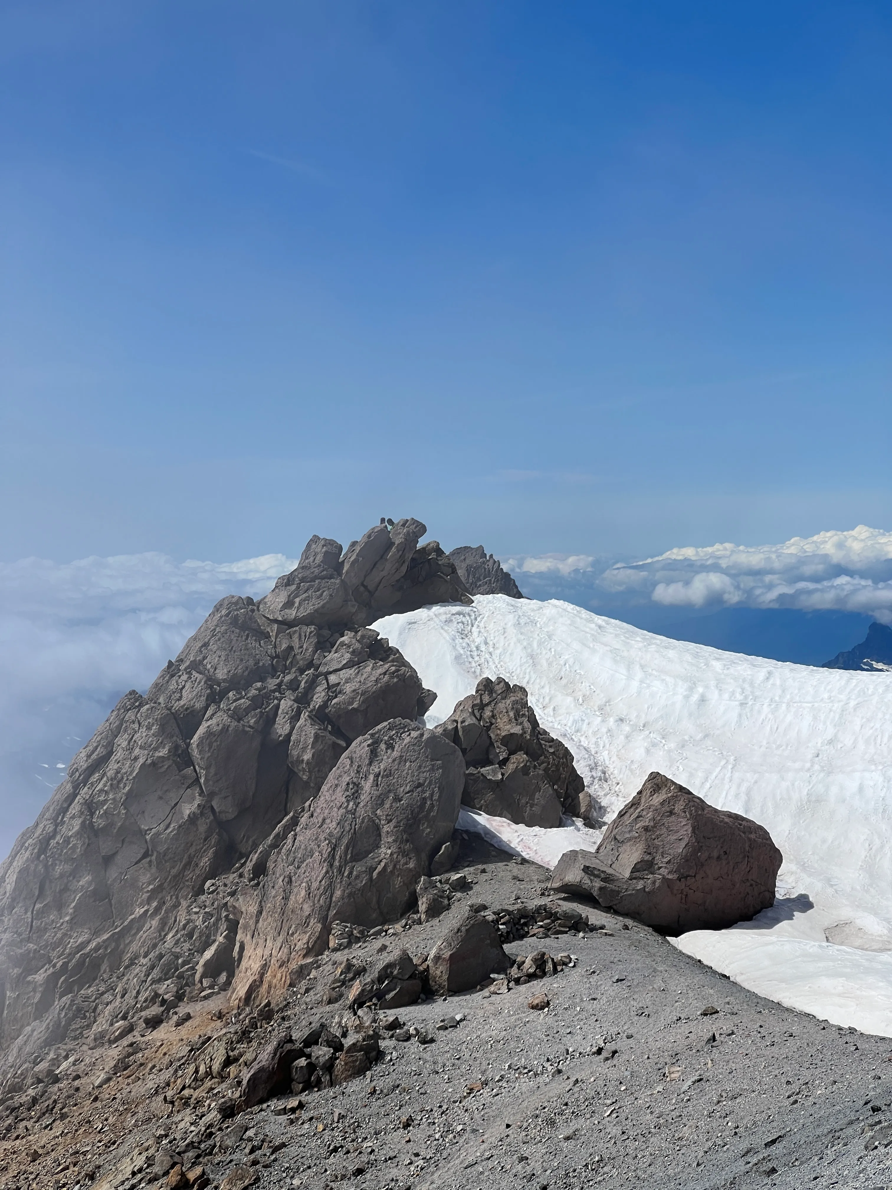Sweet victory, the summit block a stone's throw away with a couple climbers or marmots peeking at us