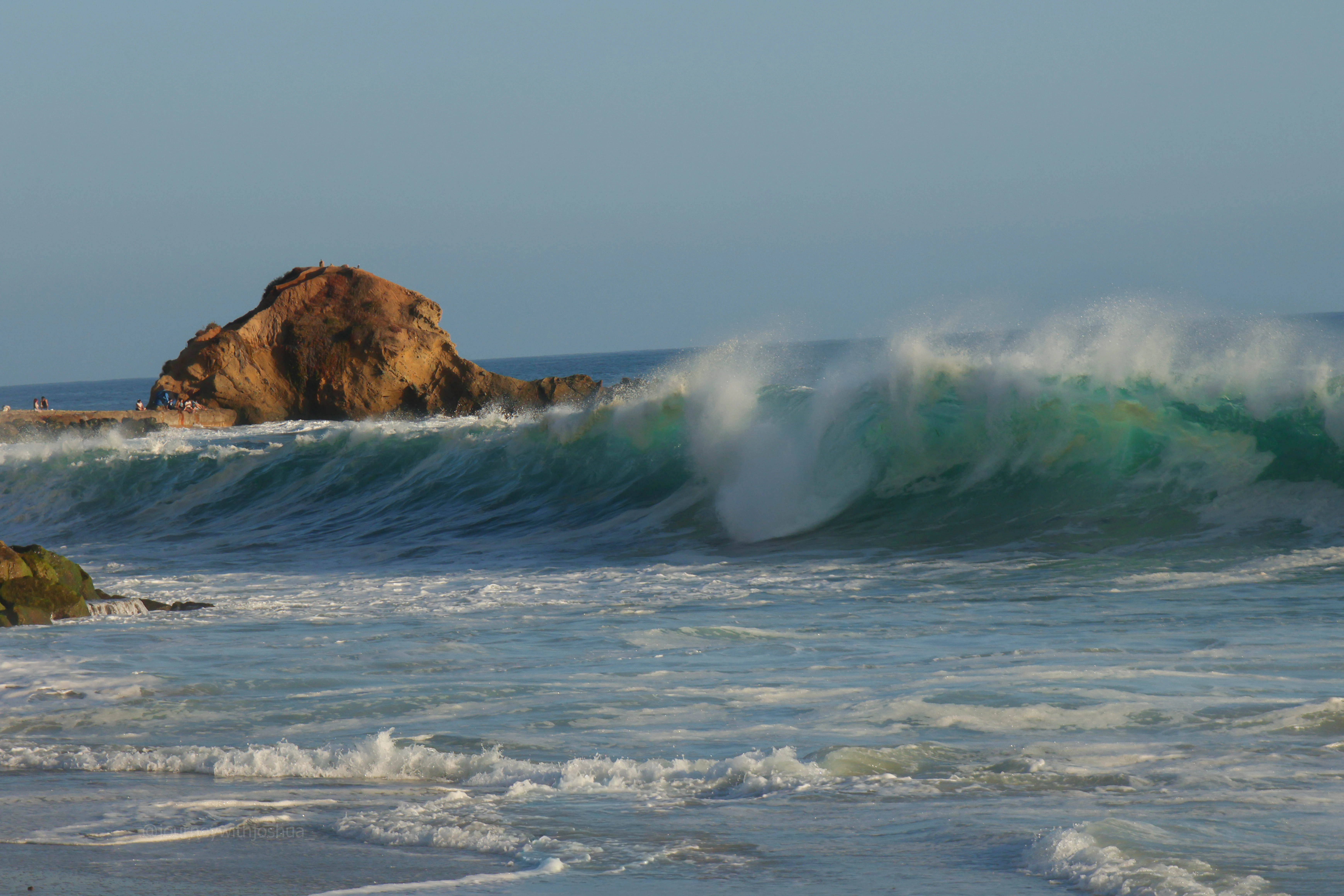 Hurricane swells crashing into the seawall at Laguna Beach.