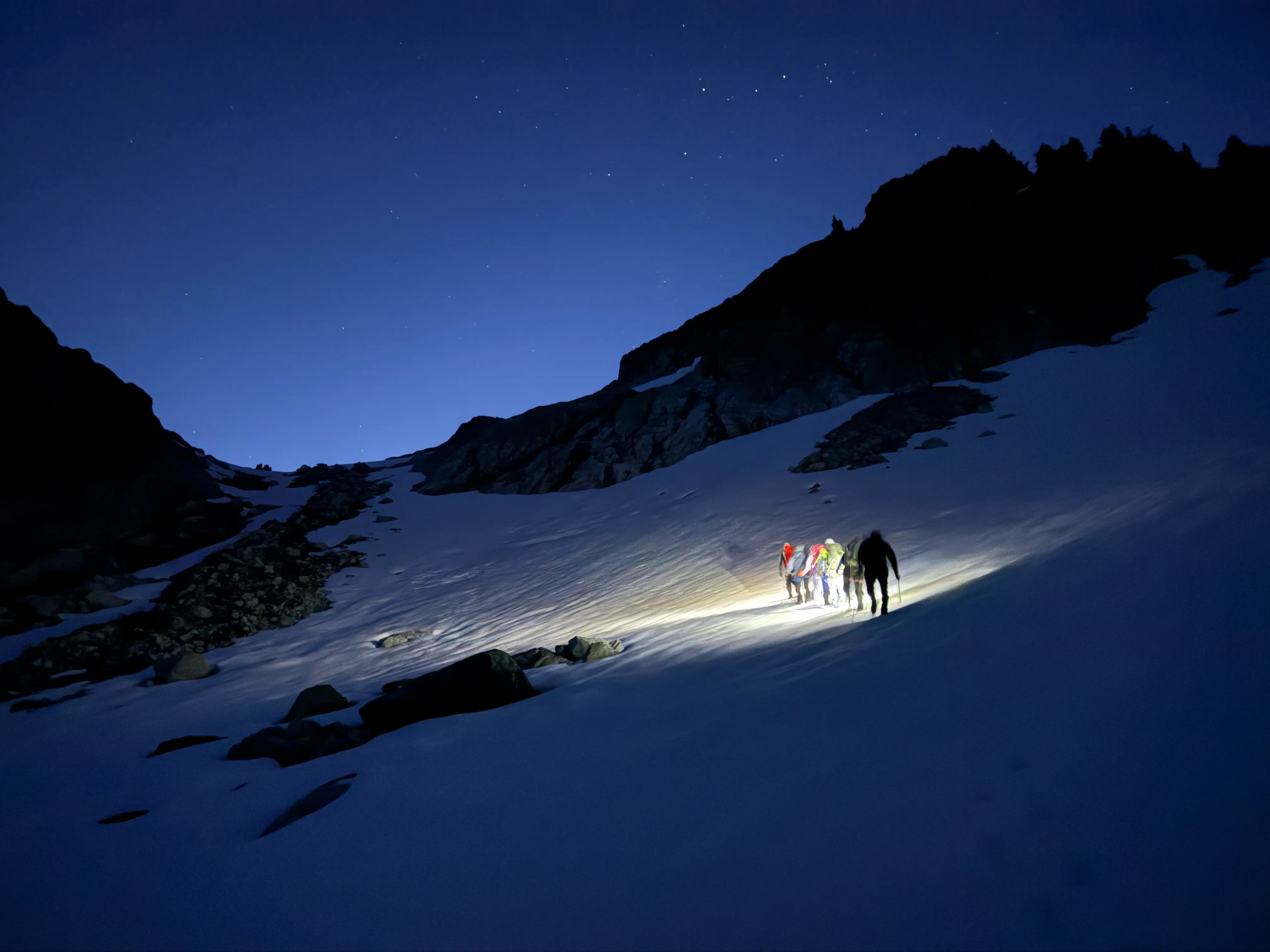 Starting up the snow gully in the dark