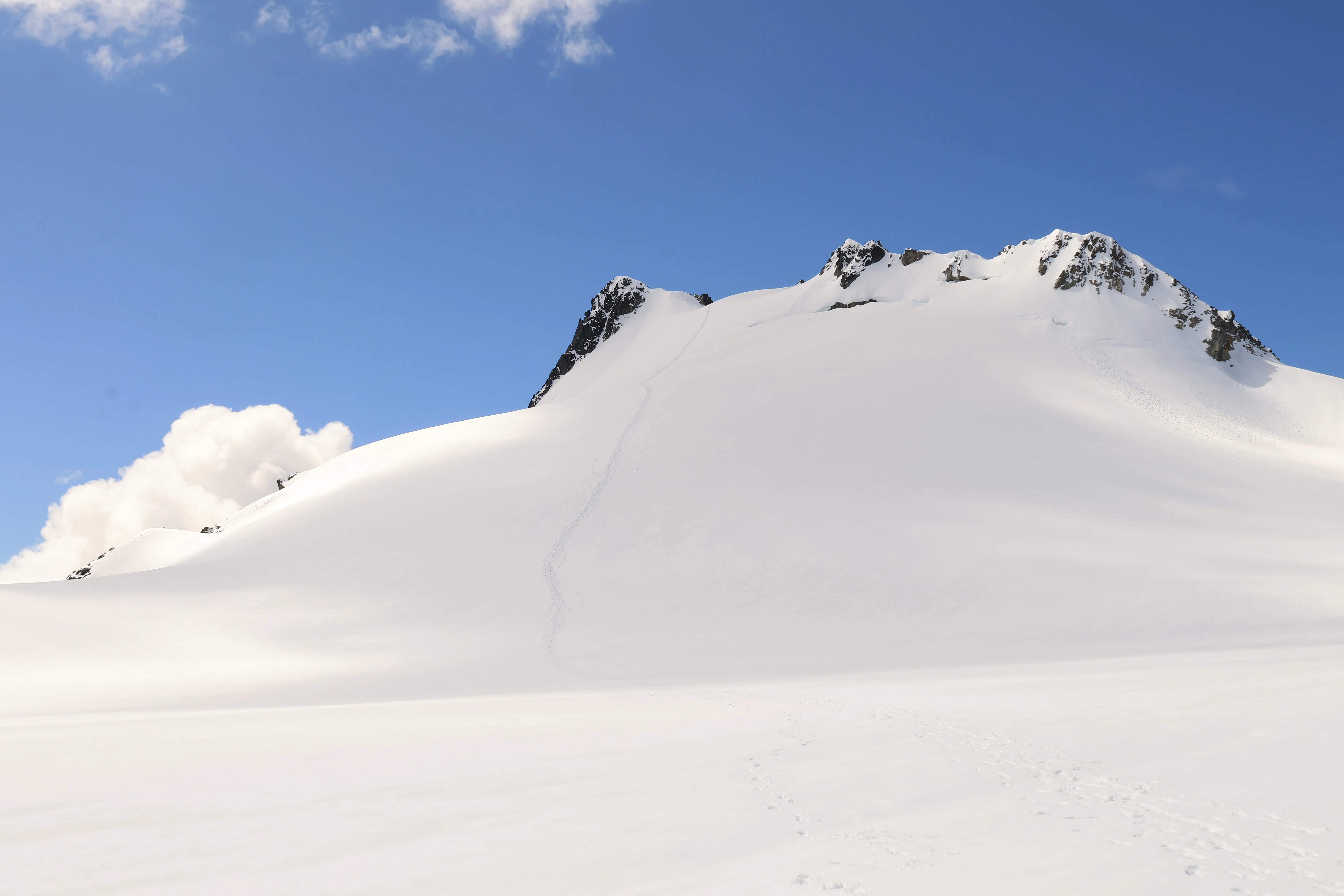 Our tracks across the icefield on the descent