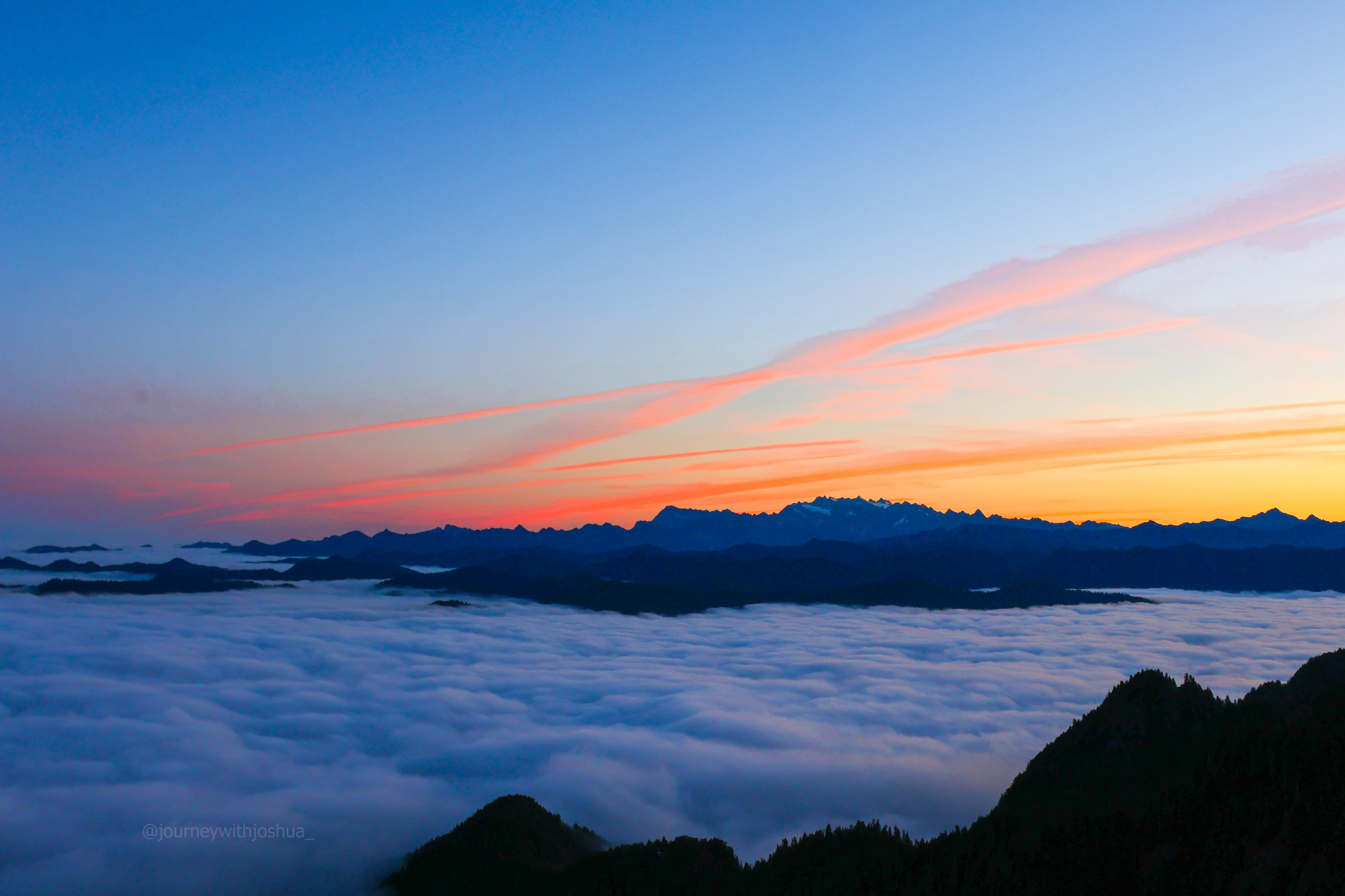 Sky on fire over Mount Olympus at sunset from the Olympic Range.