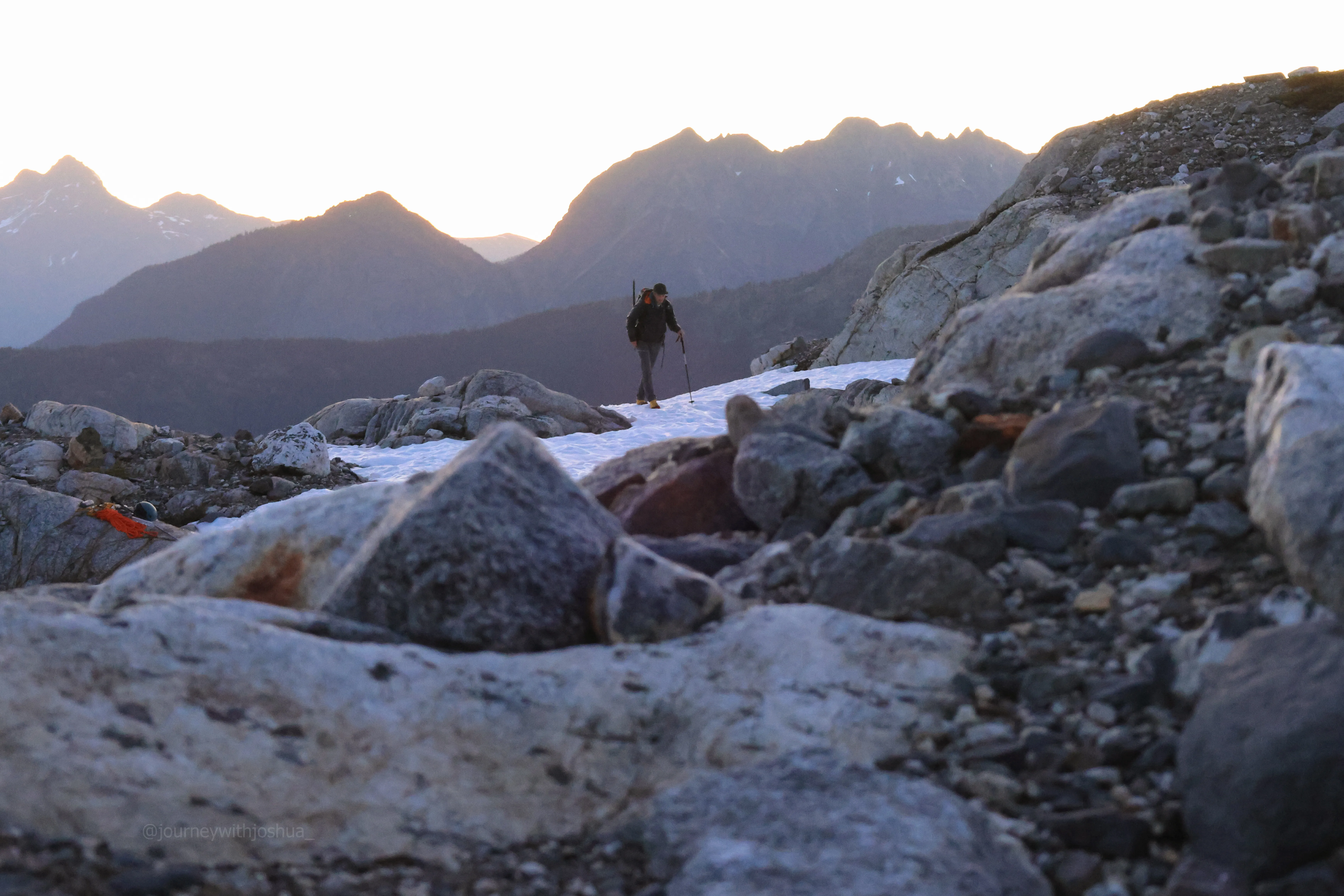 Chris hiking over from his campsite at sunrise on summit morning