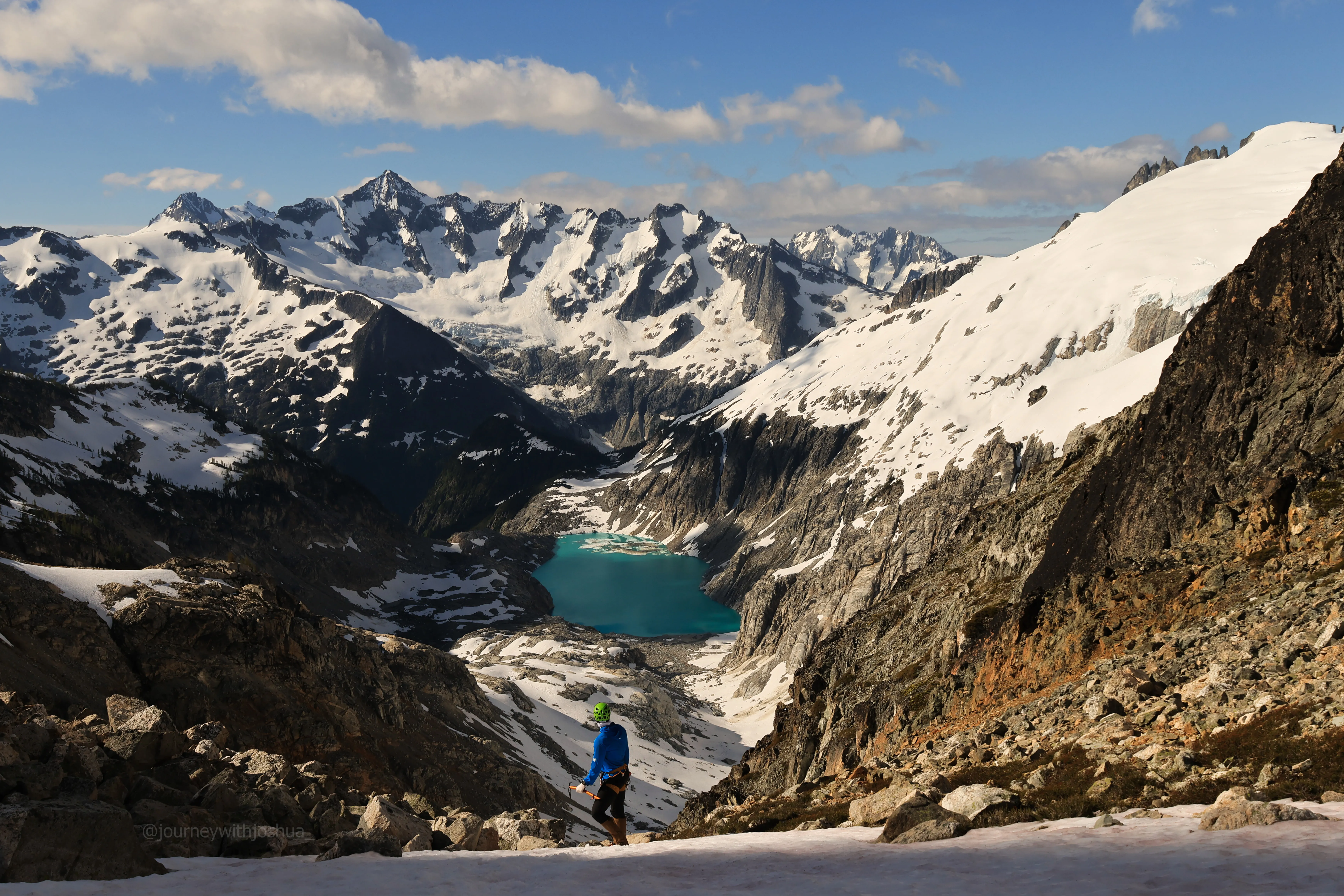 The view from Lucky Pass over Klawatti Lake and a wall of North Cascades peaks