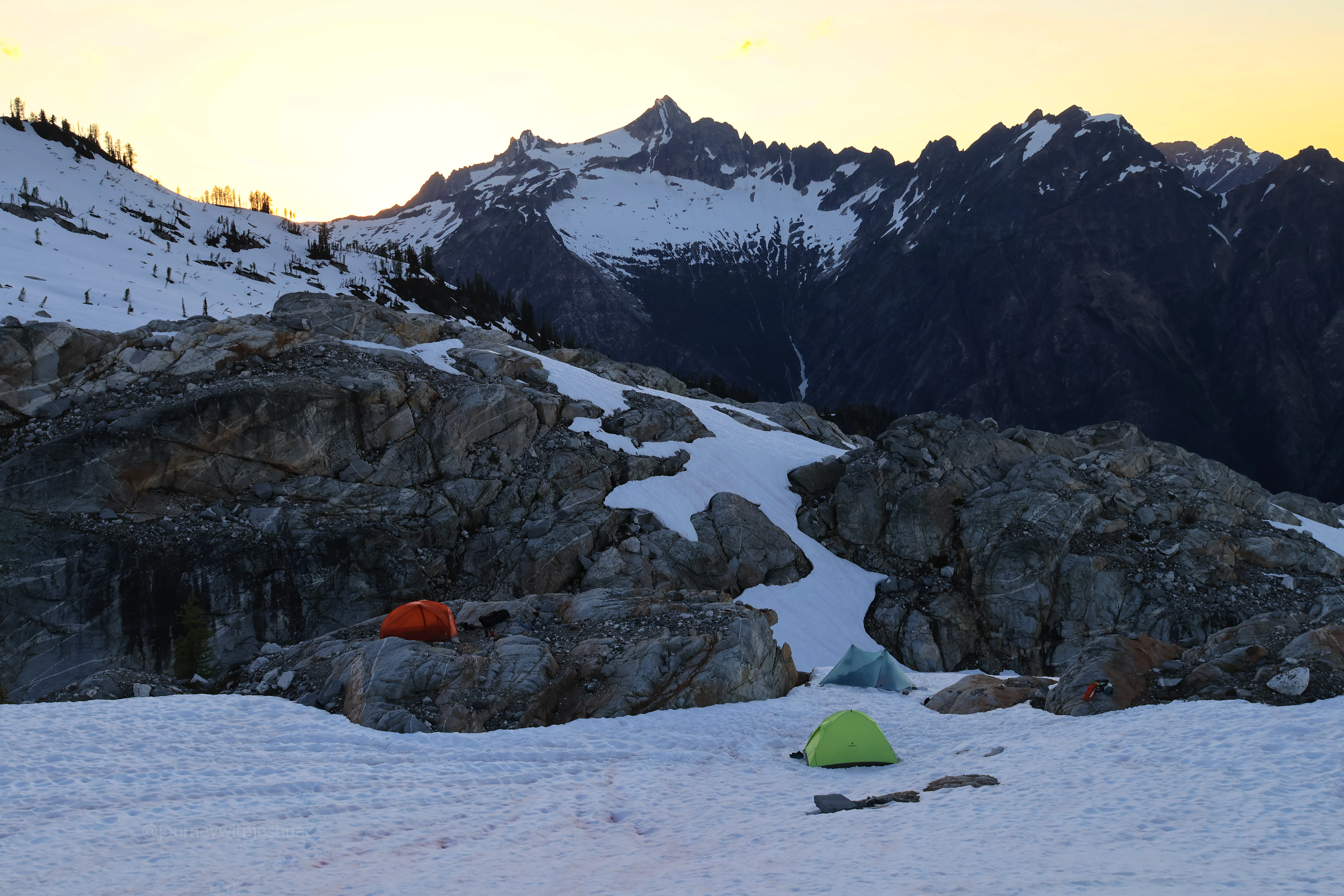 Sri, Jon, and Dan taking in the sunset at high camp