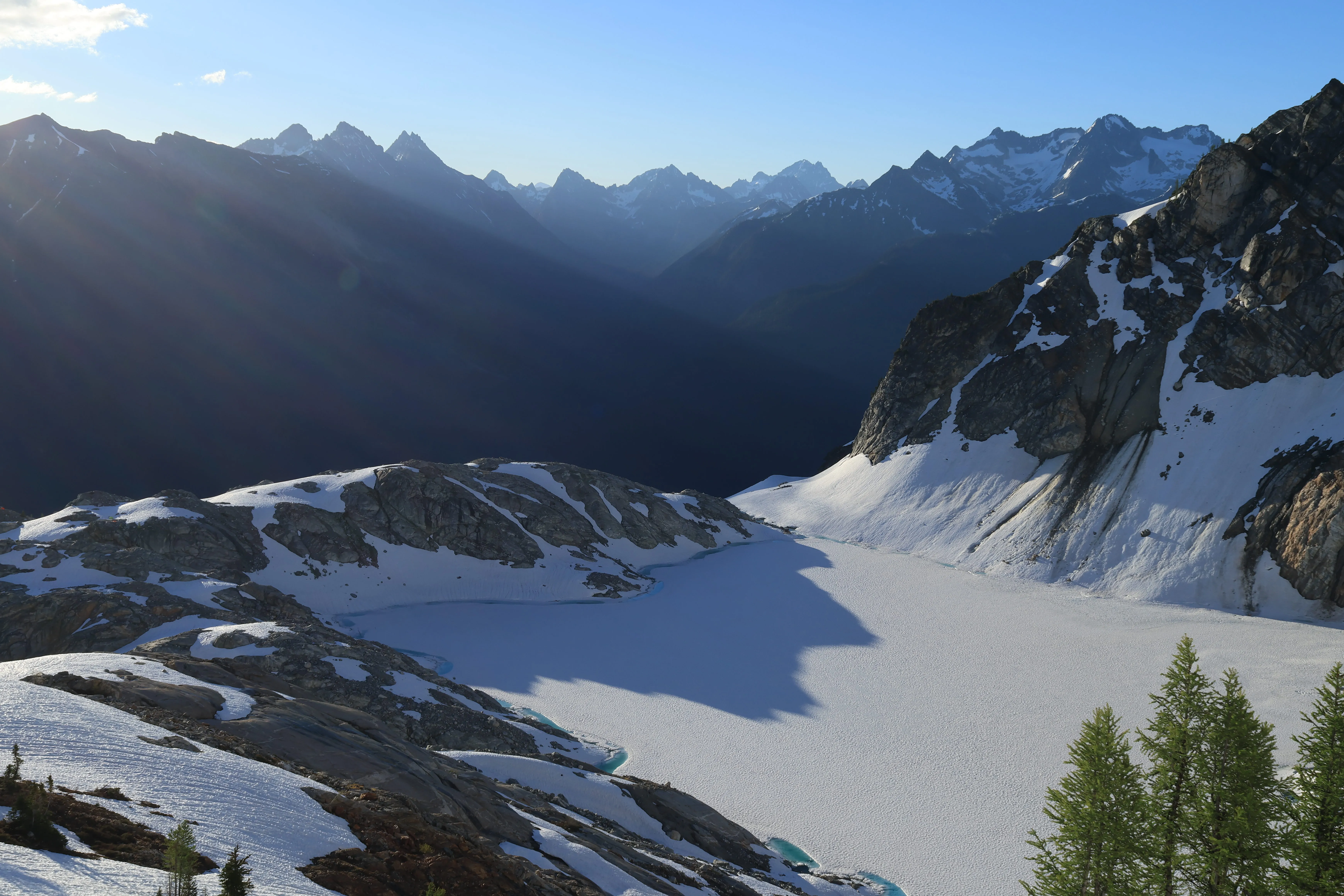 Sunrise over Borealis Lake seen from the glacier below Mount Primus.