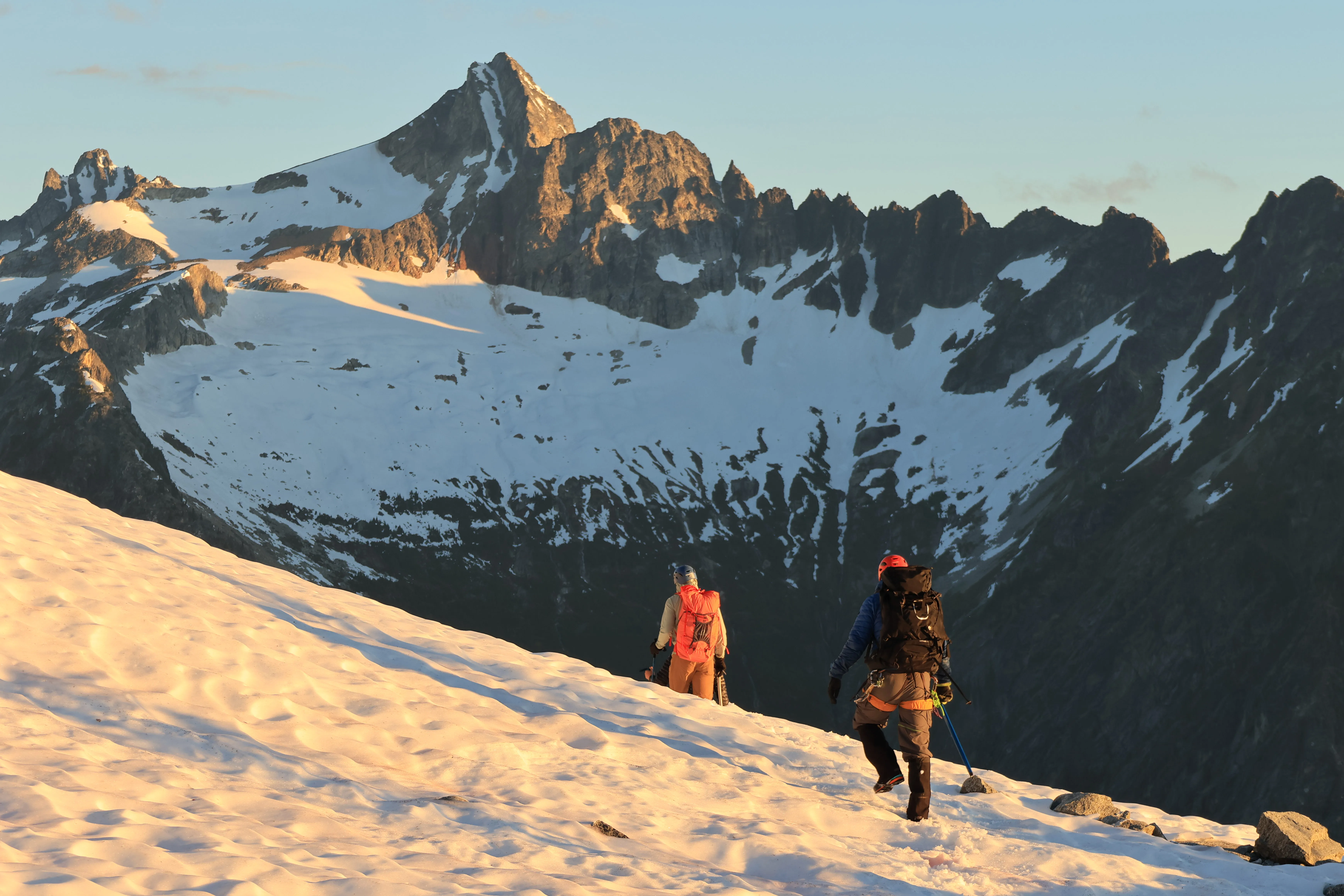 The team beginning the ascent from high camp with Snowfield Peak behind