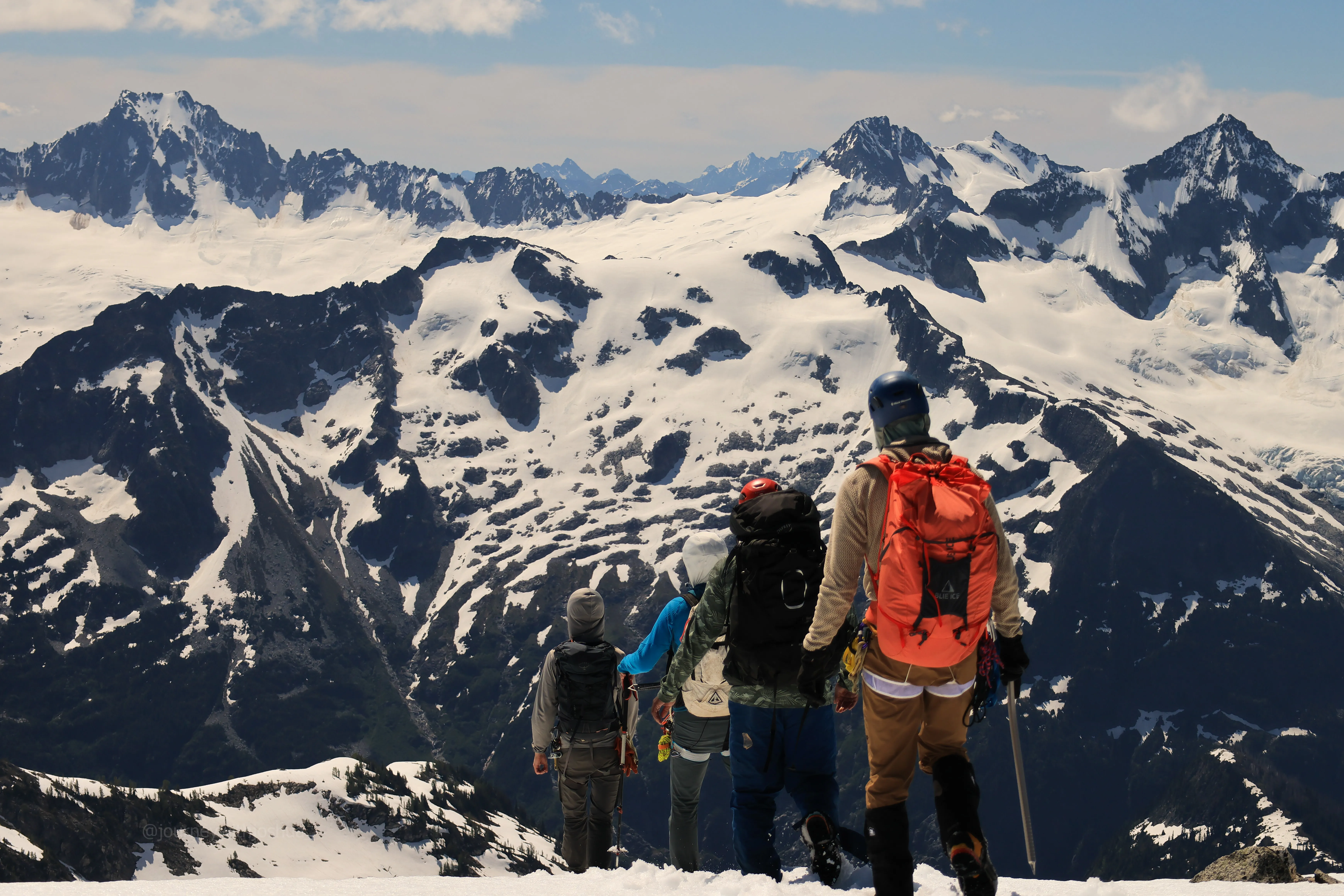 The team beginning the descent back down from the summit of Primus