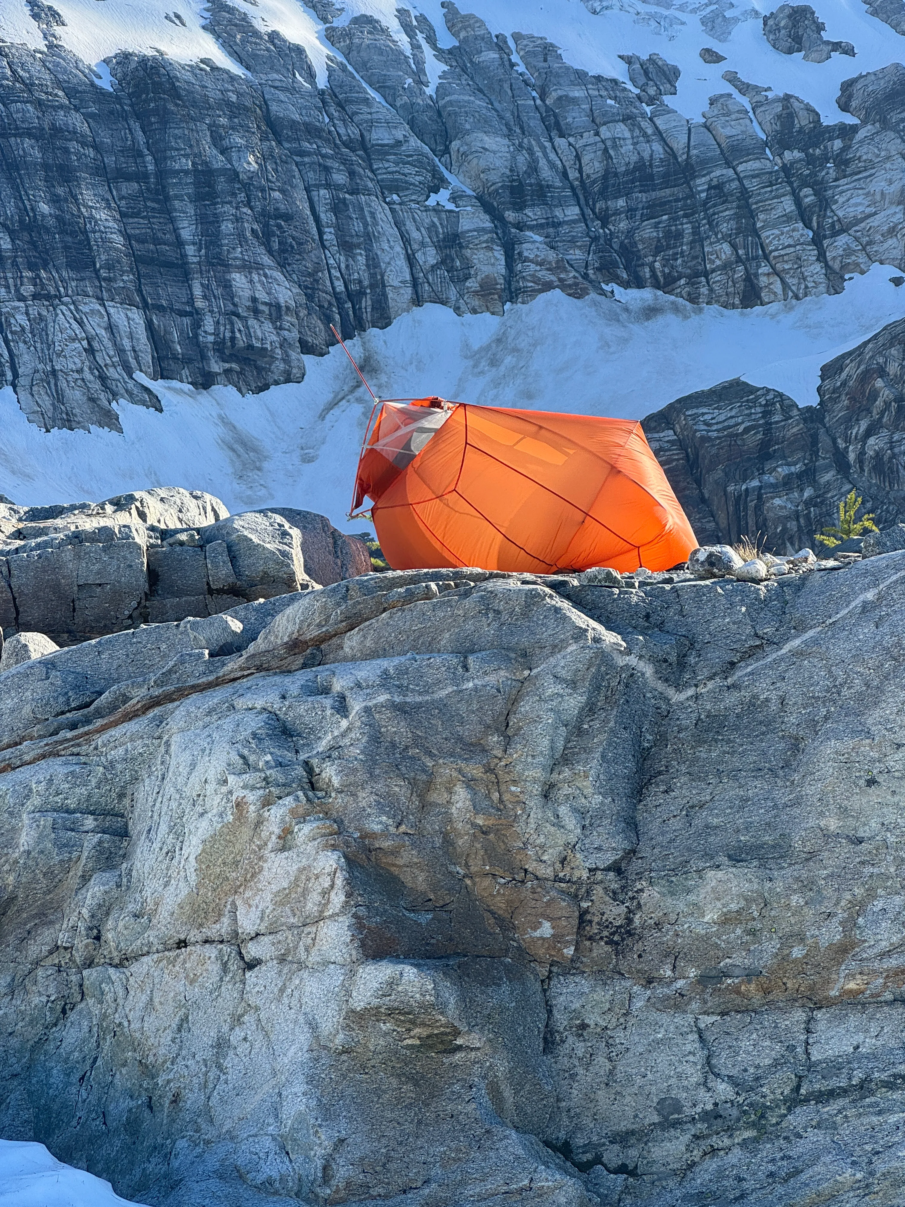 A tent getting worked by the wind at high camp