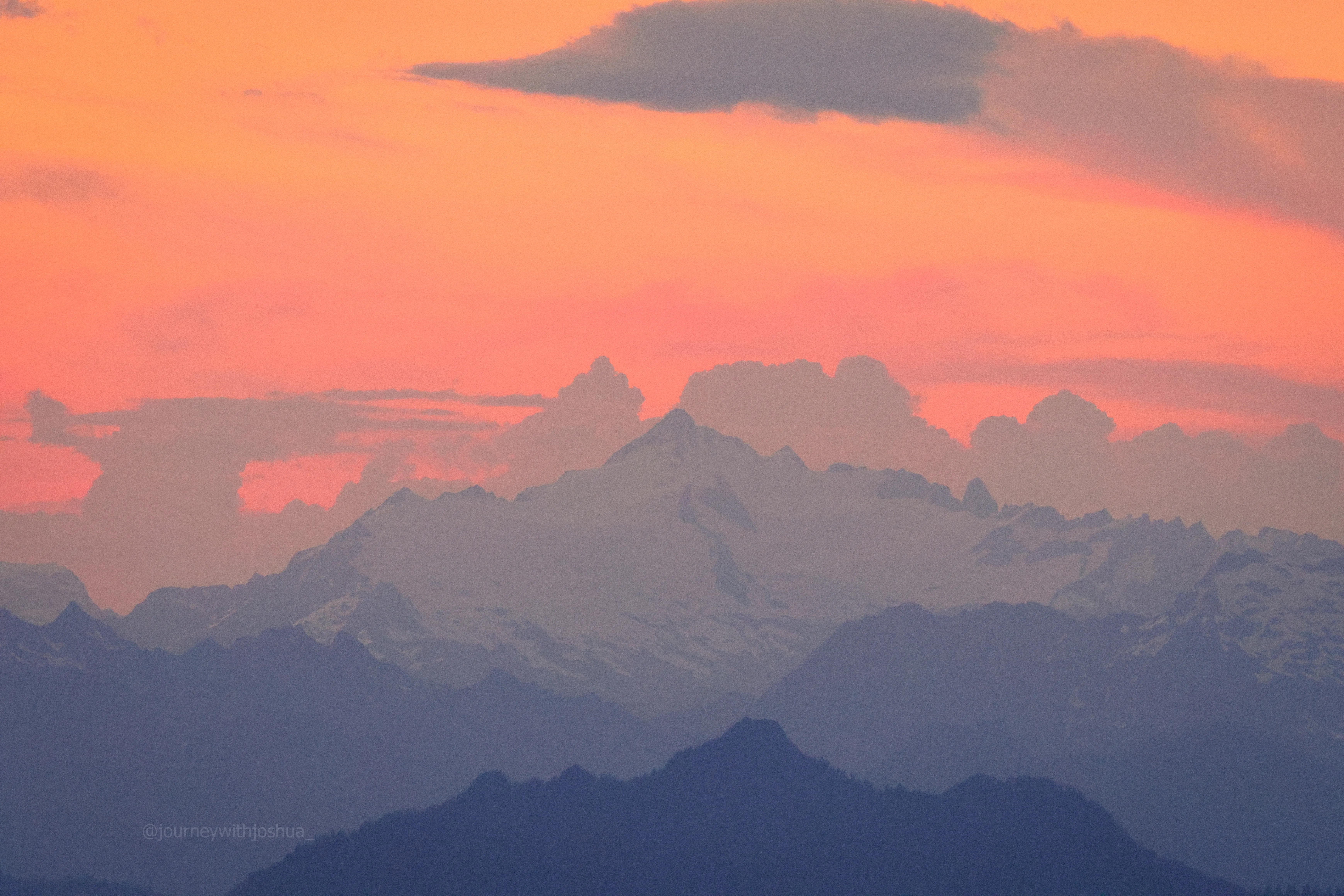 Mount Shuksan on the edge of the incoming storm at sunset