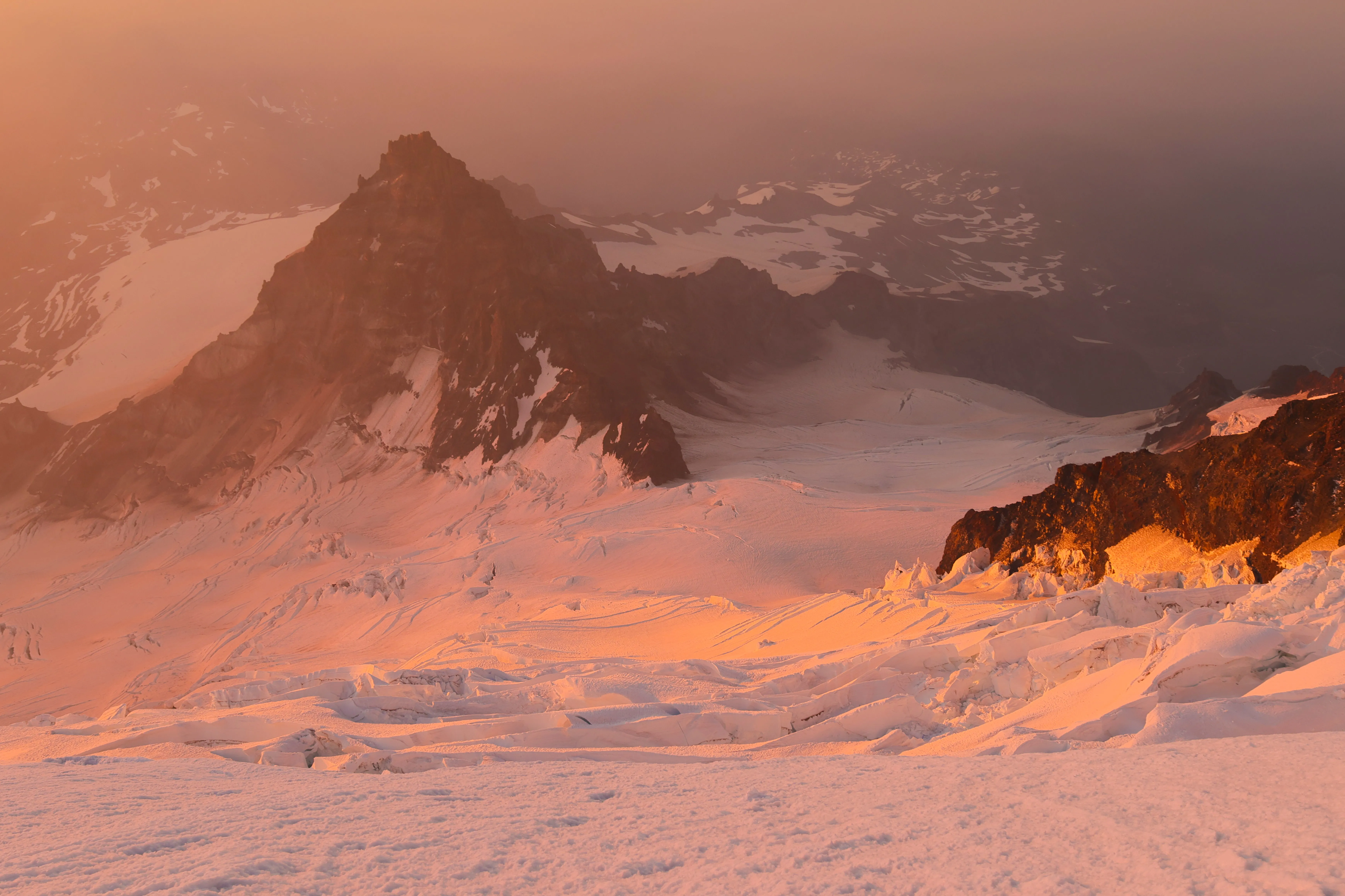 Alpenglow over Little Tahoma and the upper mountain