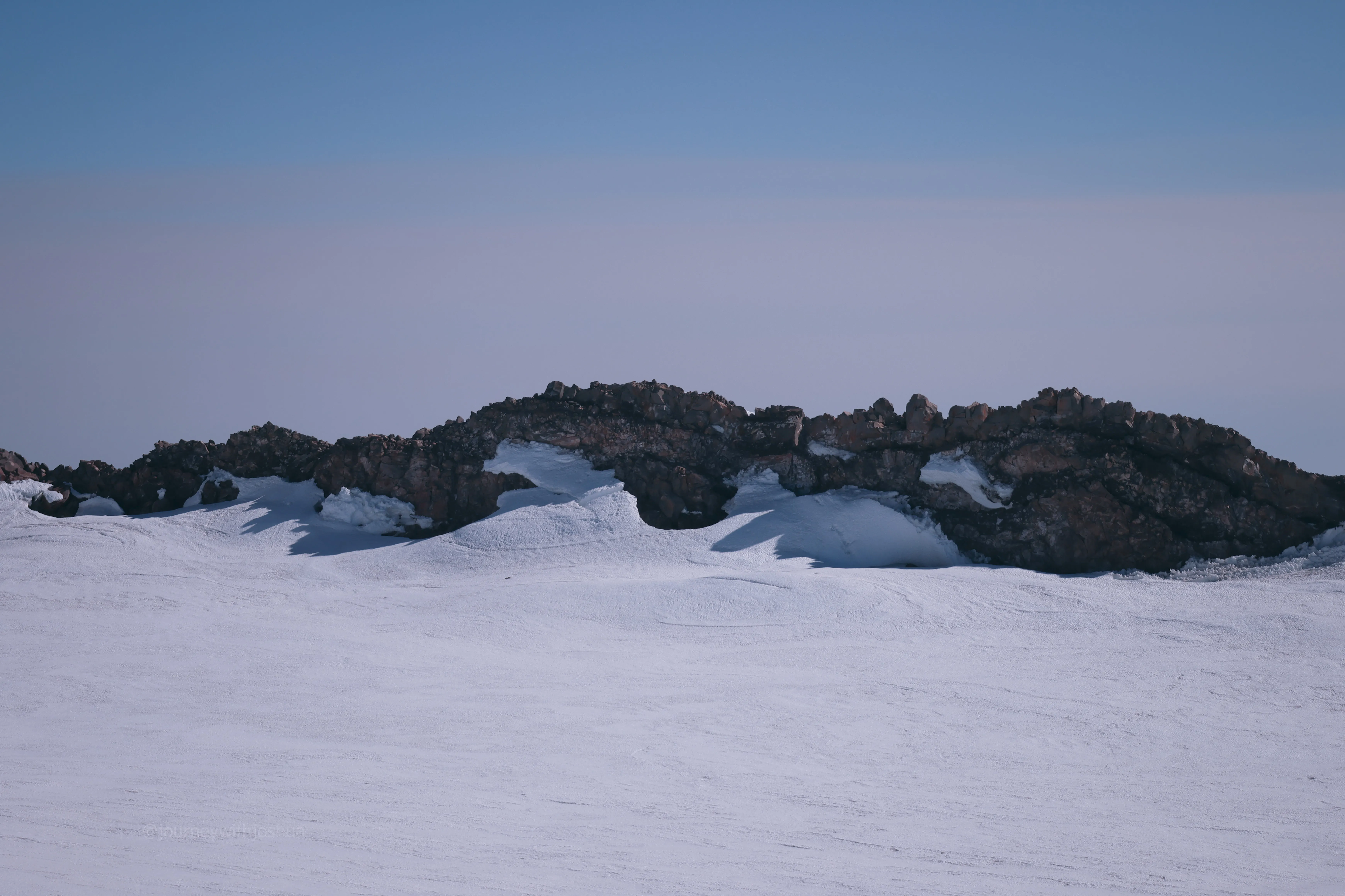 A worthy resting spot for Stella near the volcanic crater rim
