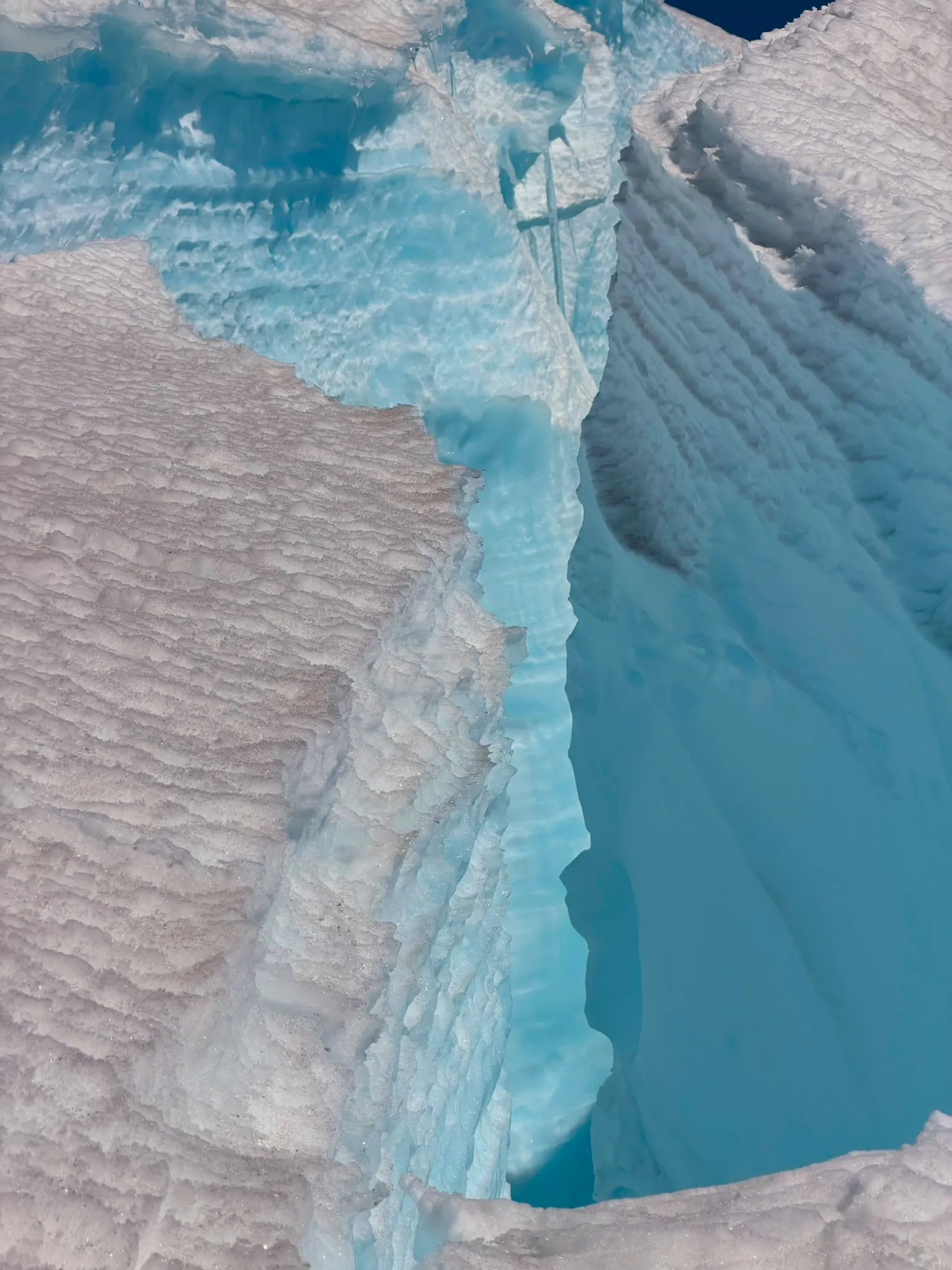 More deep crevasses splitting the glacier in every direction