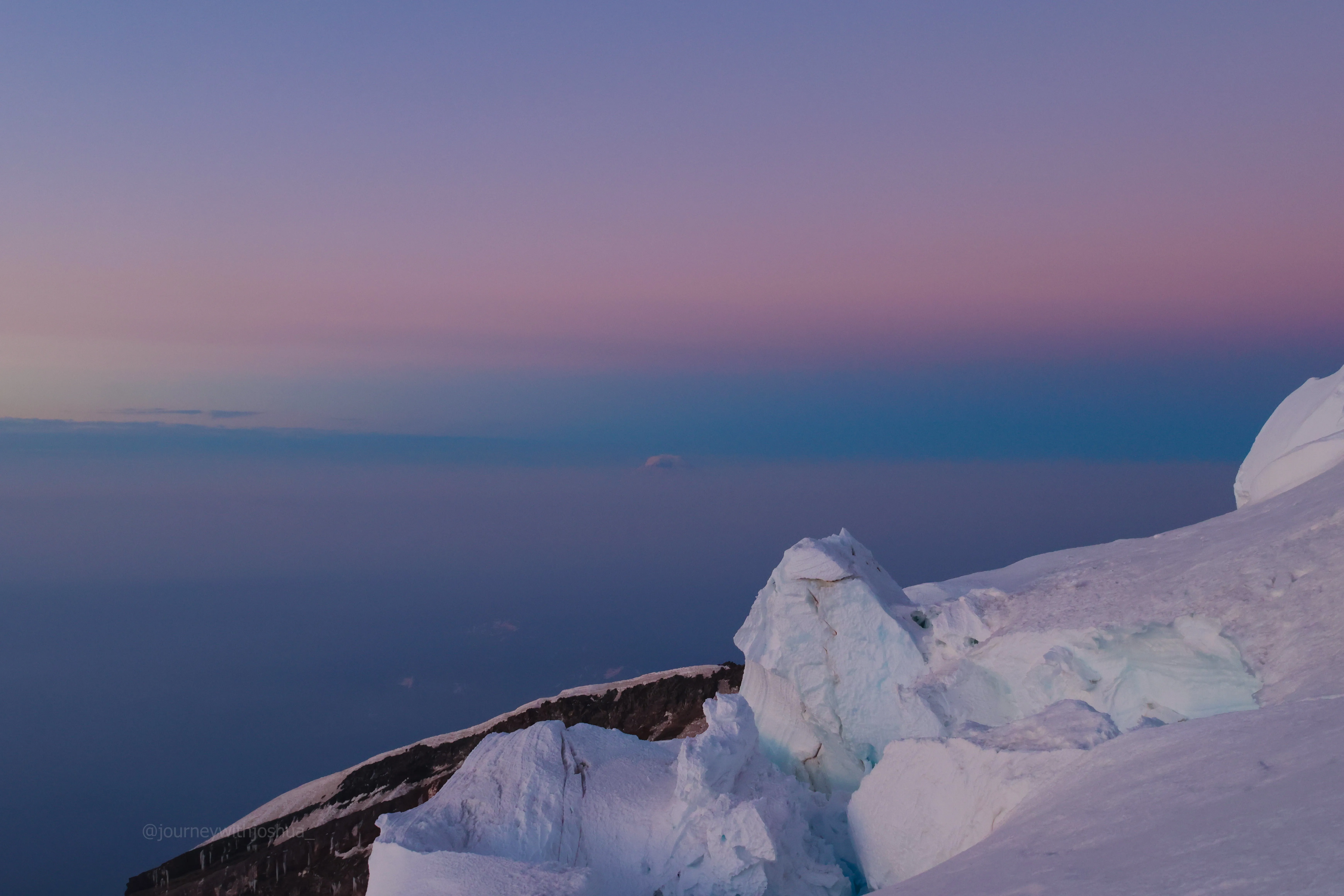 Early morning view of Mount Adams in purple hues