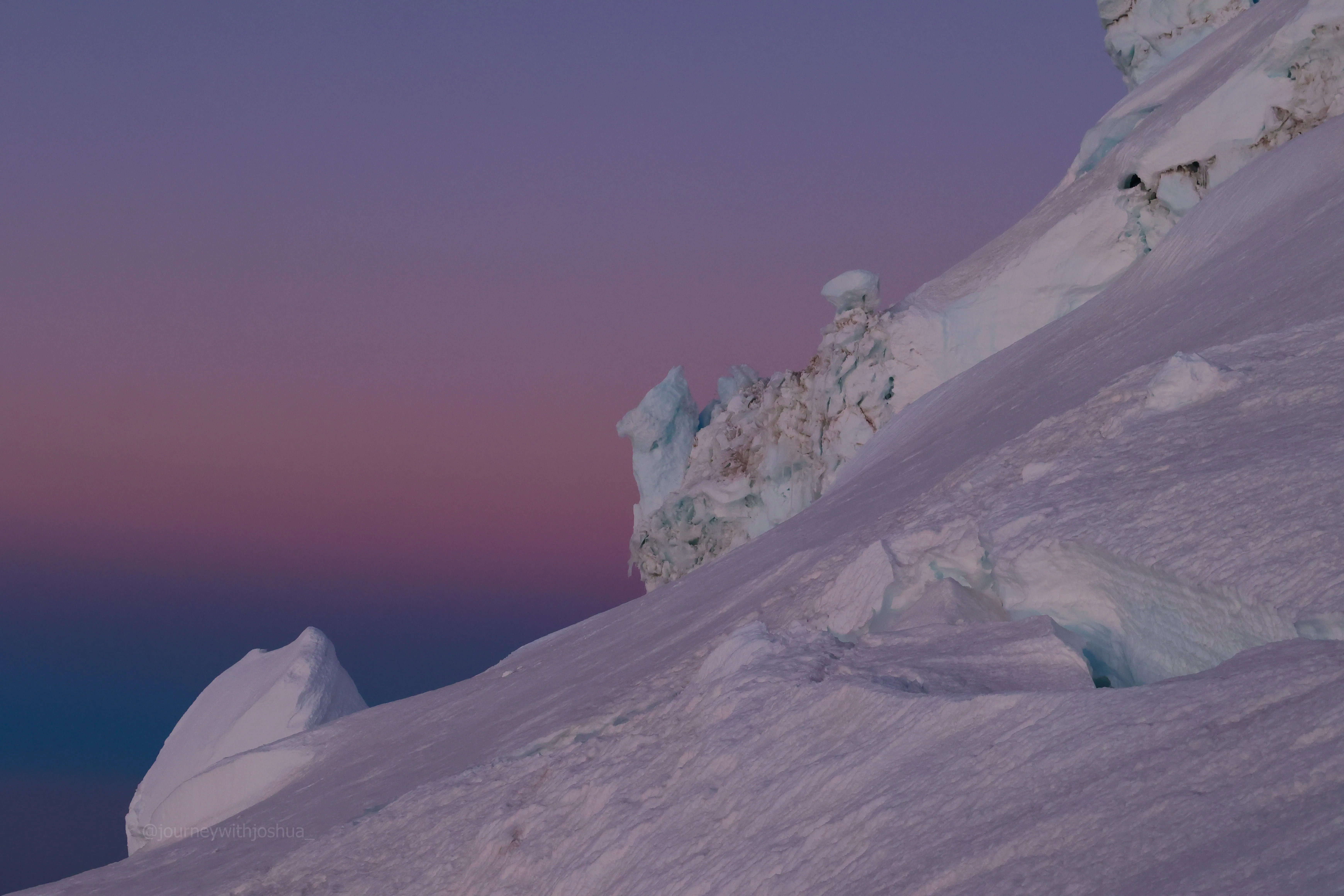 More glacier and purple sunrise hues on the upper mountain
