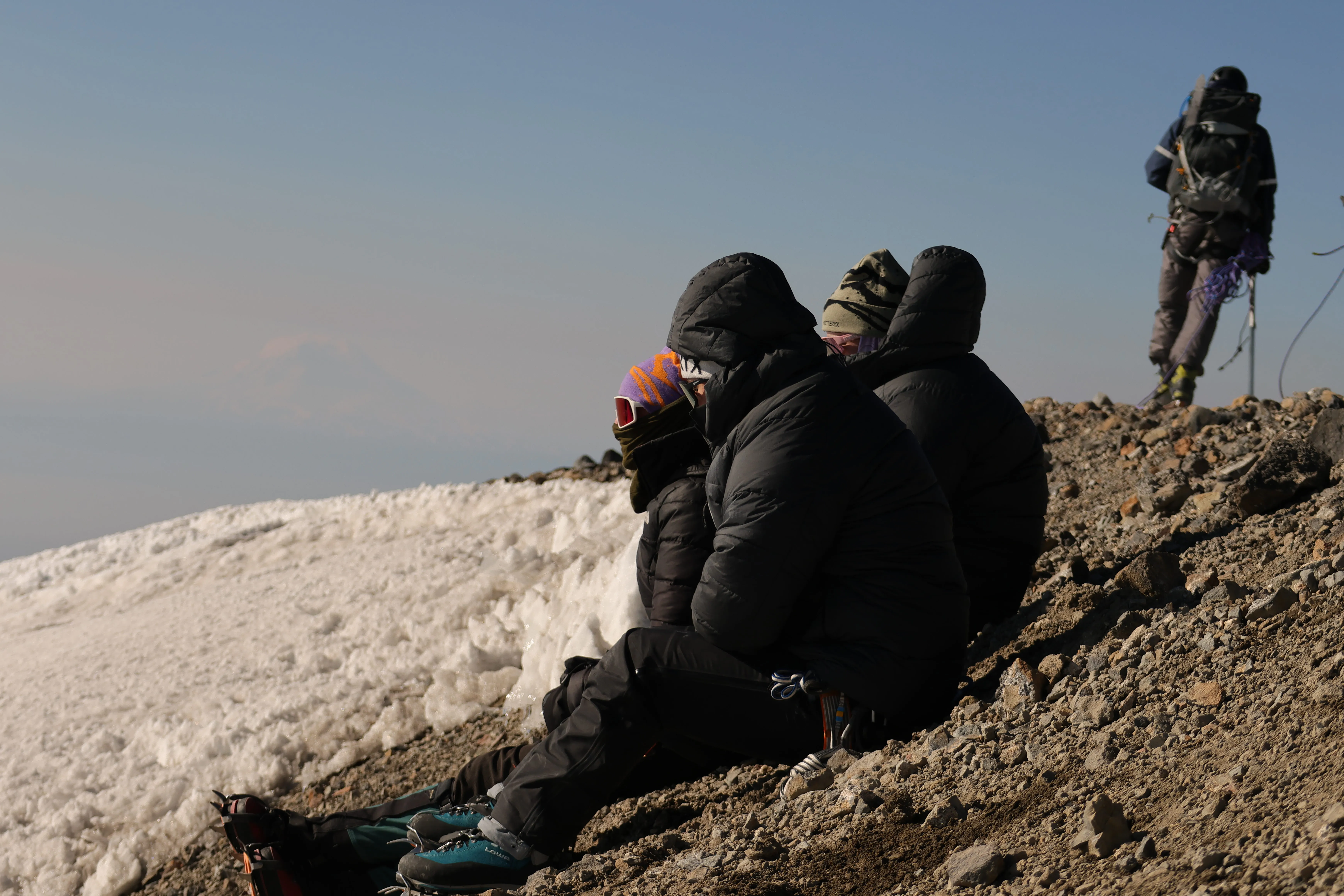 The team resting at the summit