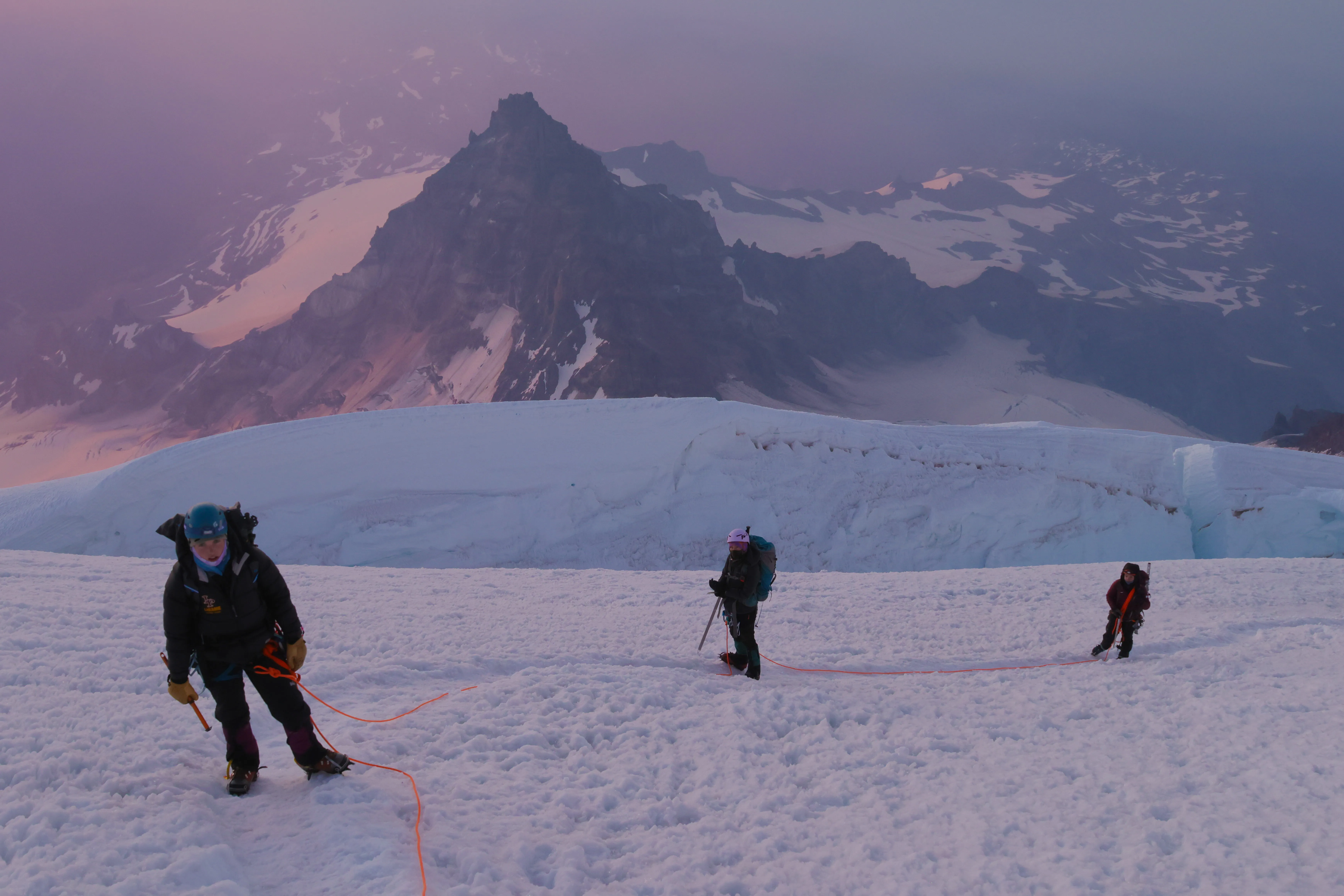 The team moving into the upper mountain above Little Tahoma