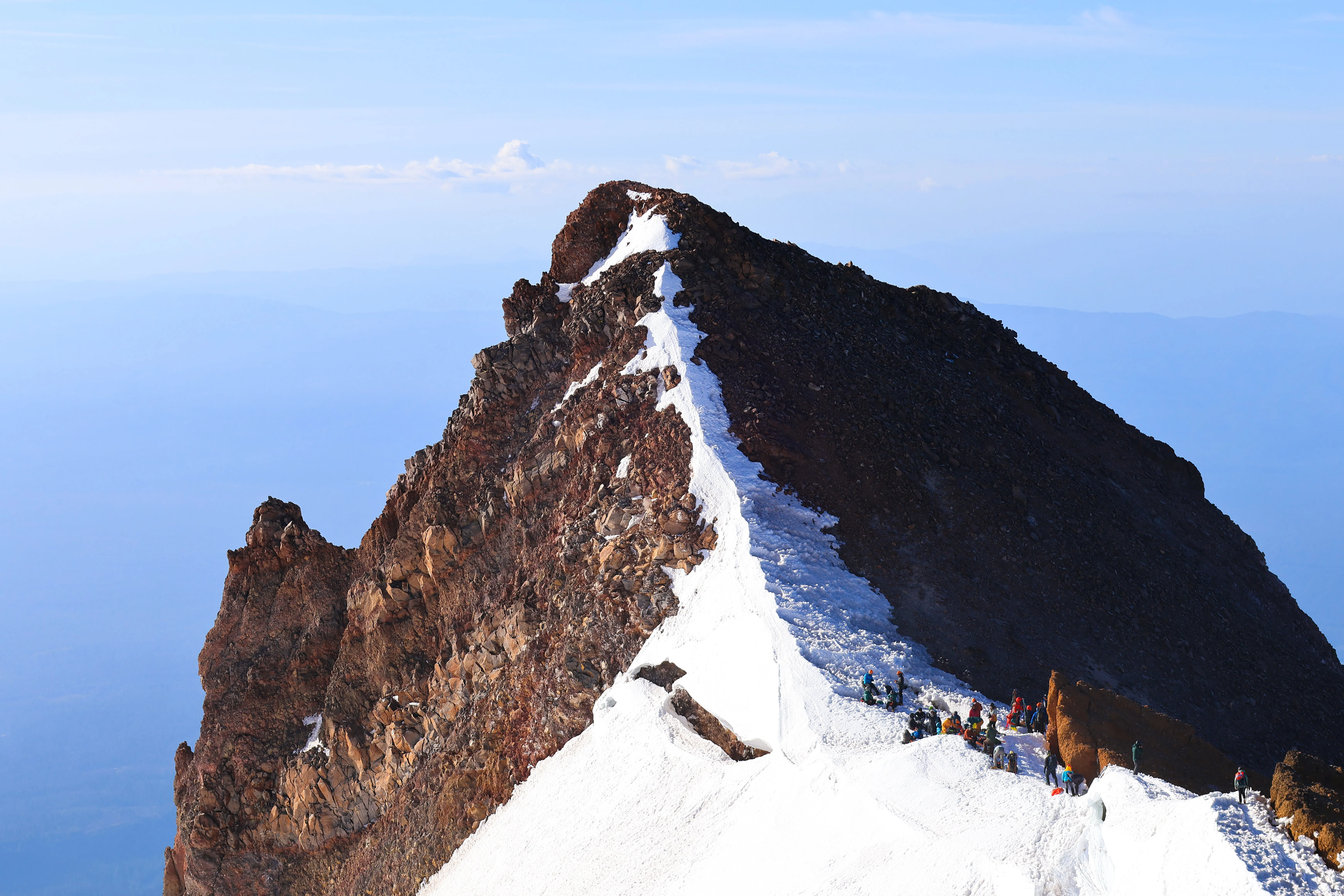 The team looking down at the Red Banks traverse