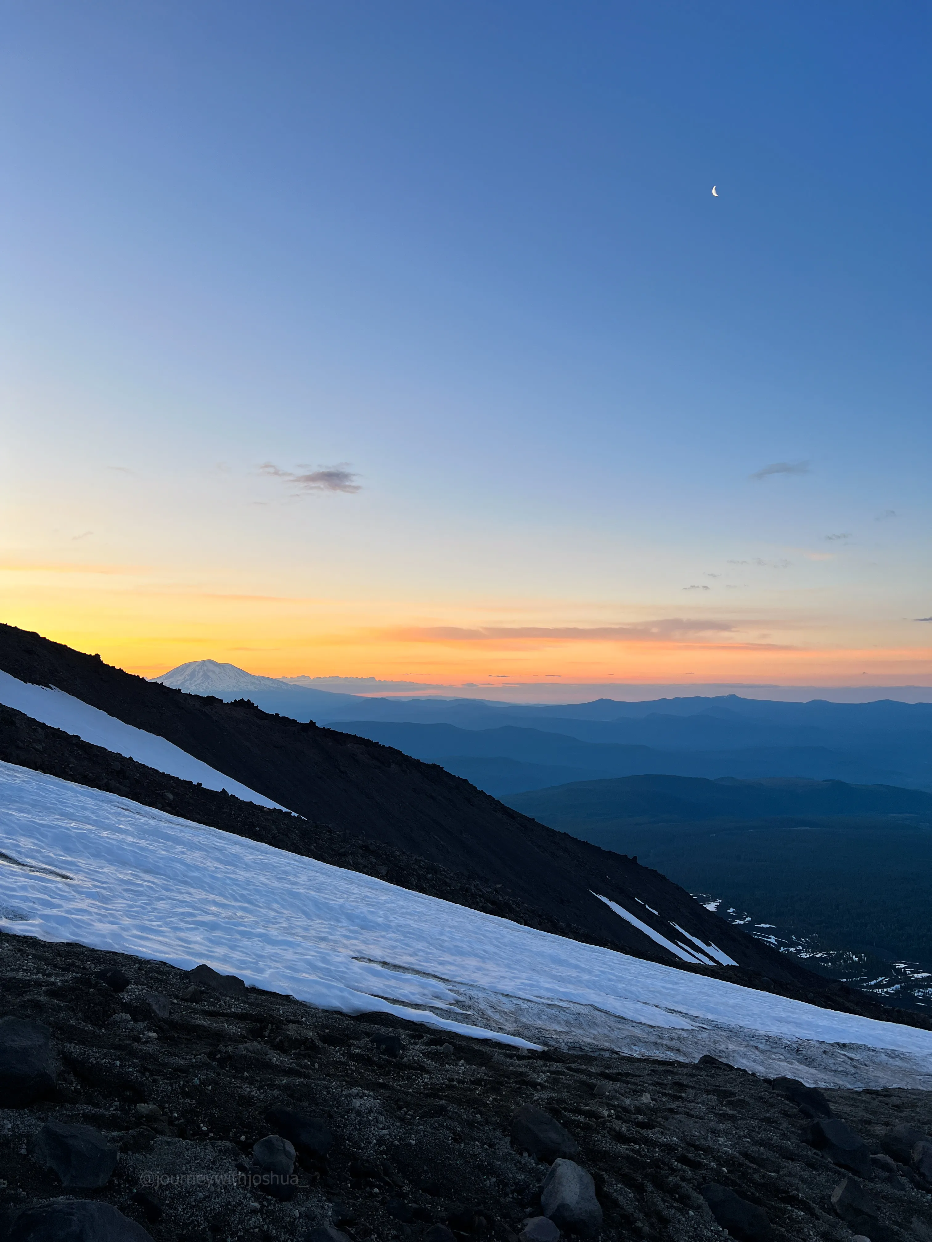 Sunrise to the east with Mount Adams and the moon, from the upper snow slope