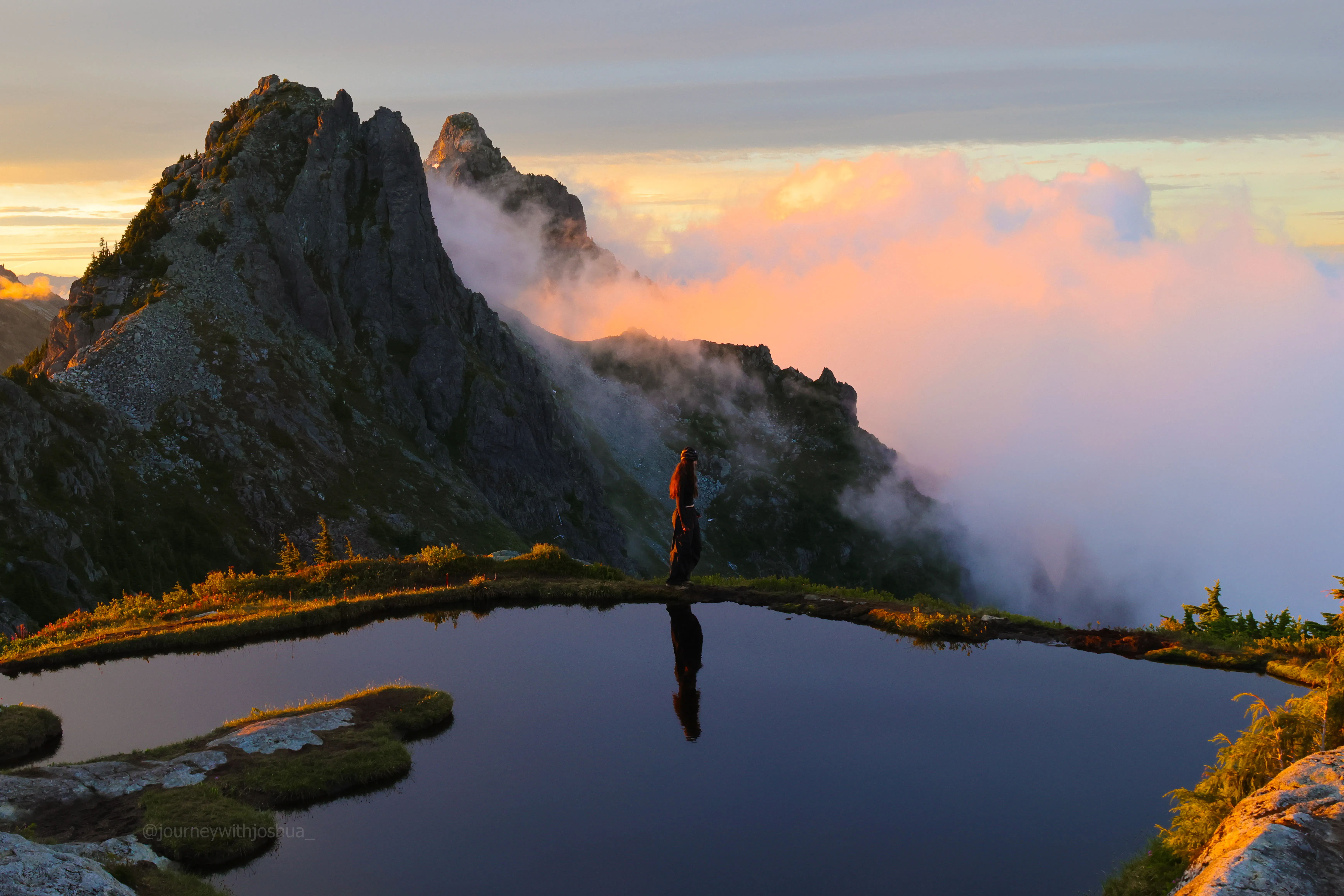 Haley at the tarn bathed in the sunrise glow