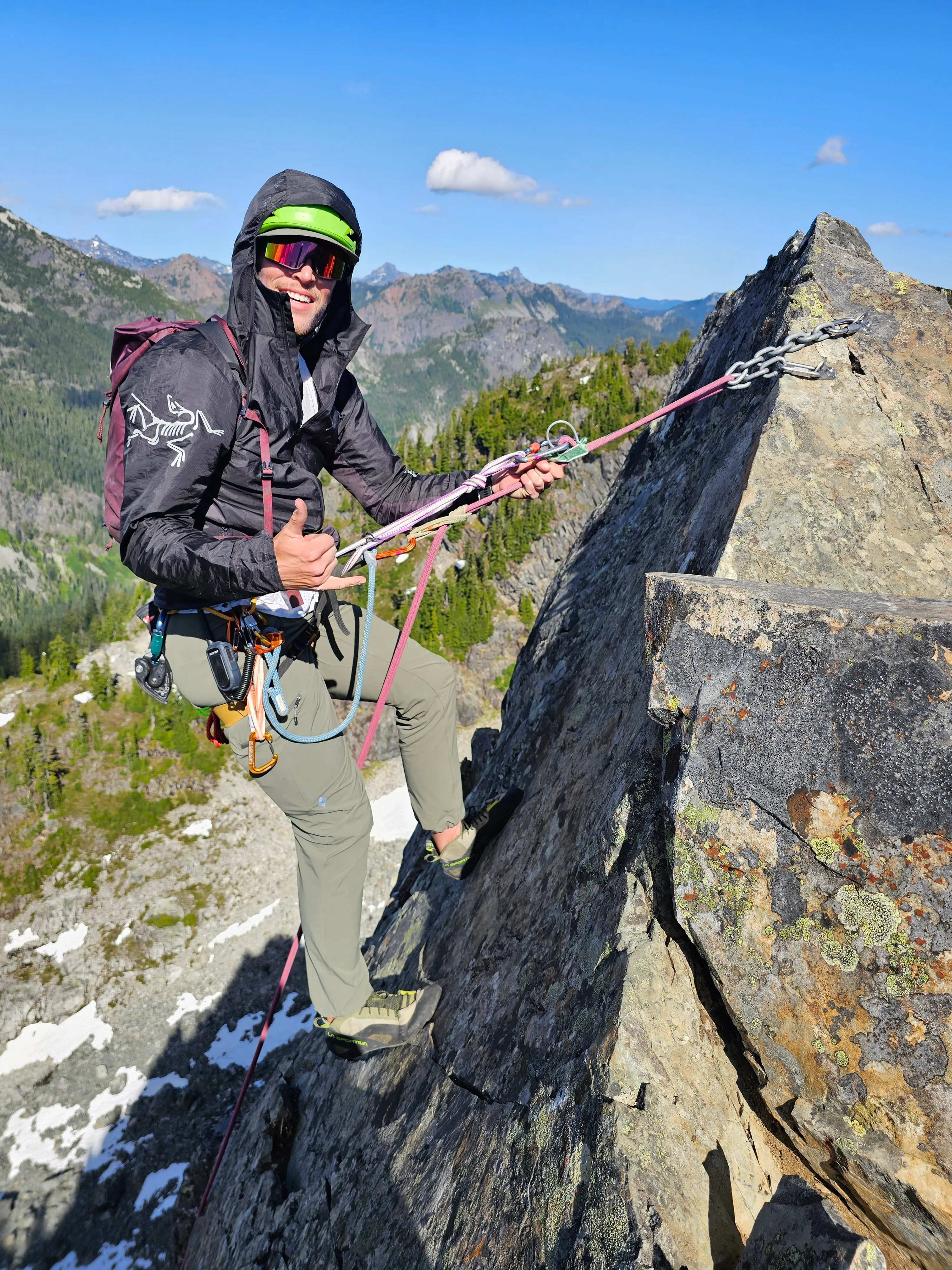 Dropping into the first steep rappel off the summit