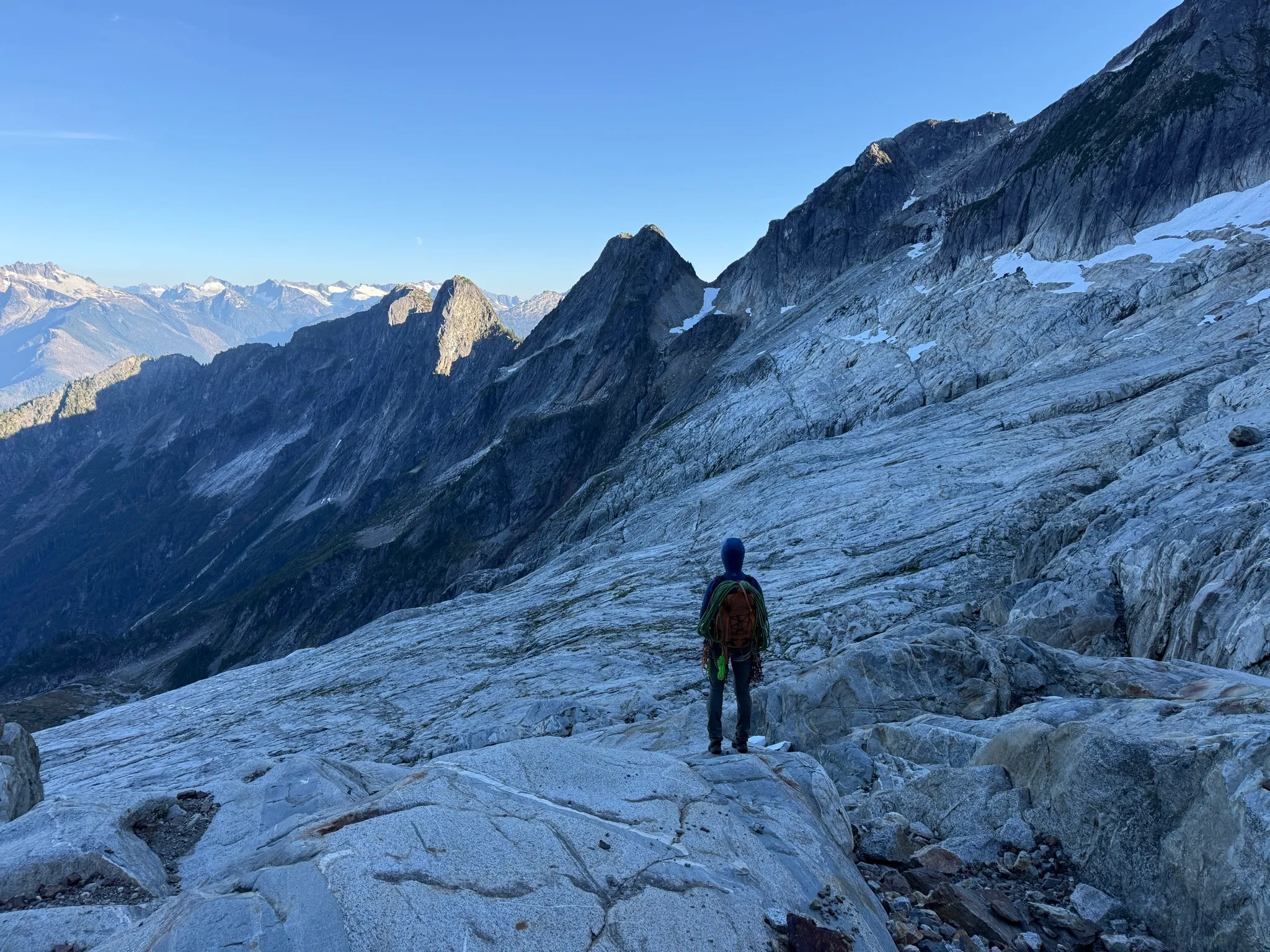 Adam looking back at the pass from the slabs on the descent of Mount Triumph, so close yet so far from camp