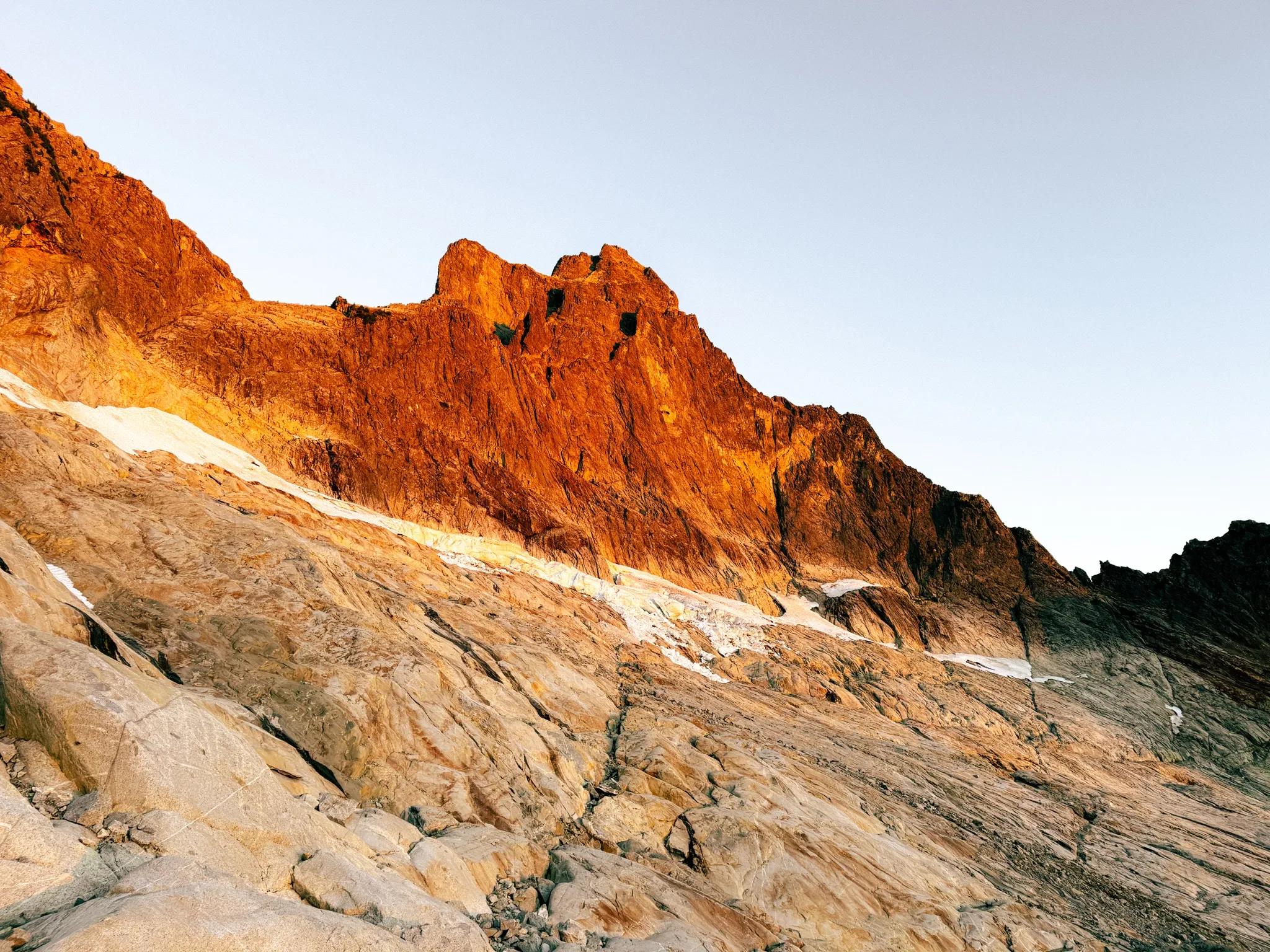 Alpenglow on Triumph and the Northeast Ridge on the approach across the slabs