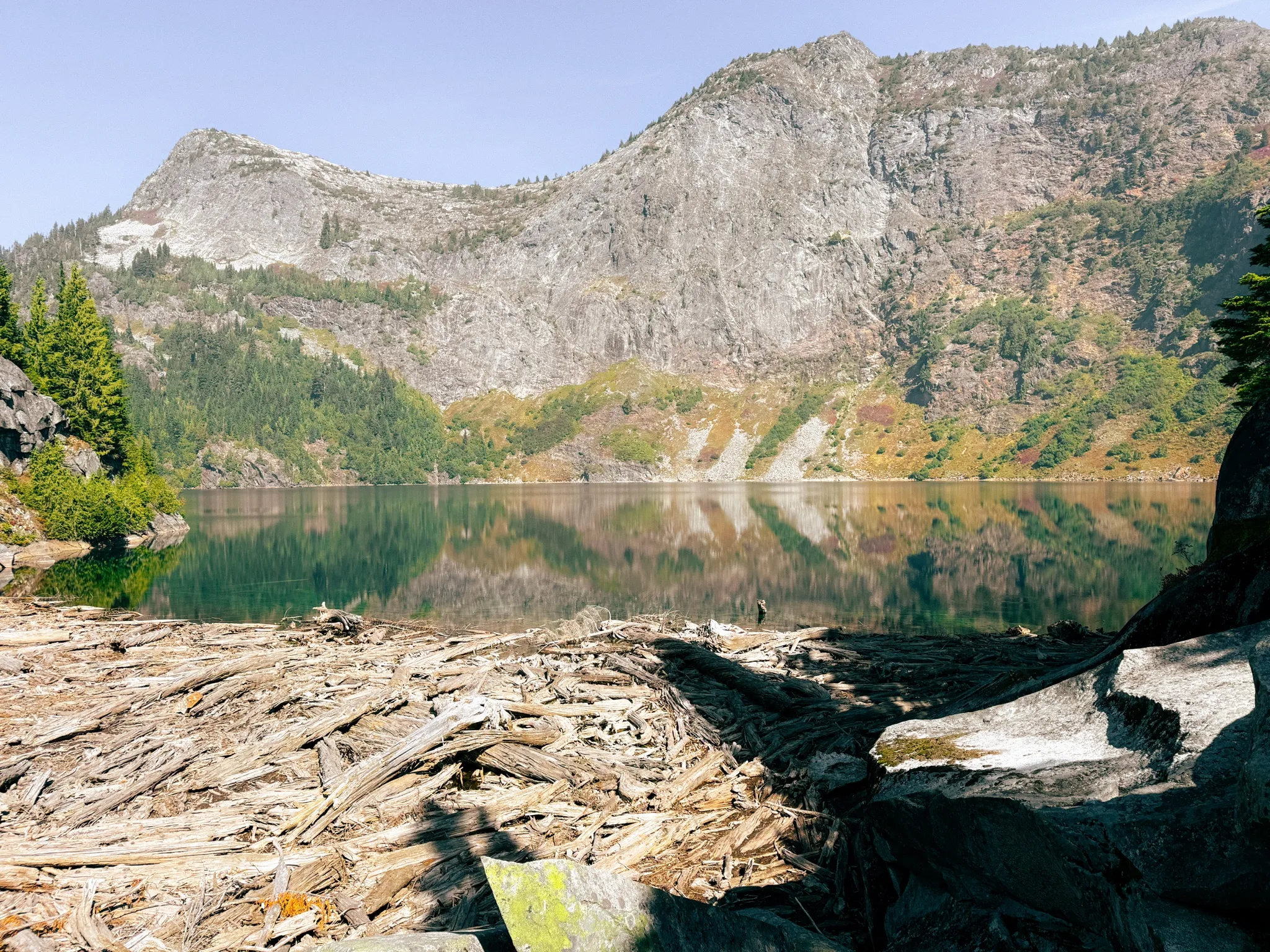 Down at the first lake and looking for the climbers trail on the approach to Mount Triumph