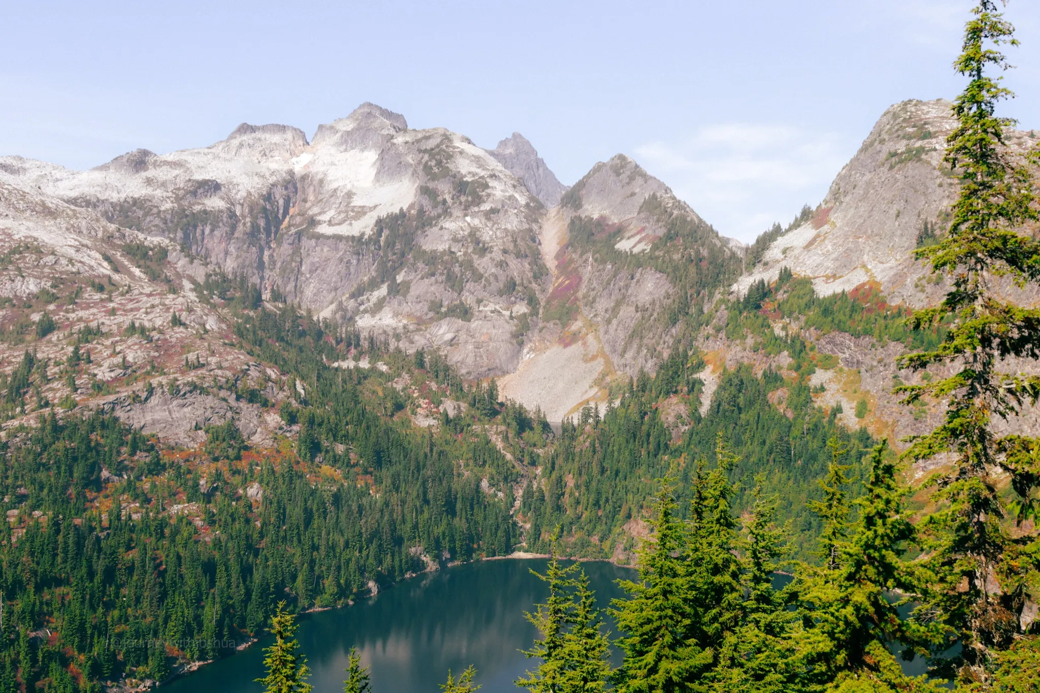 First look at Thornton Lakes on the approach to Mount Triumph, fall foliage surrounding the lakes