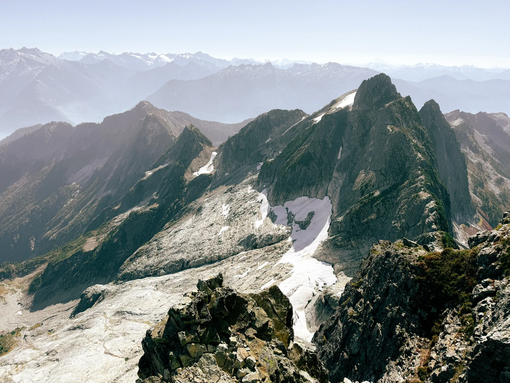 Looking back at the route from the grassy ledges just before the summit of Mount Triumph, the deep glacier gully obvious
