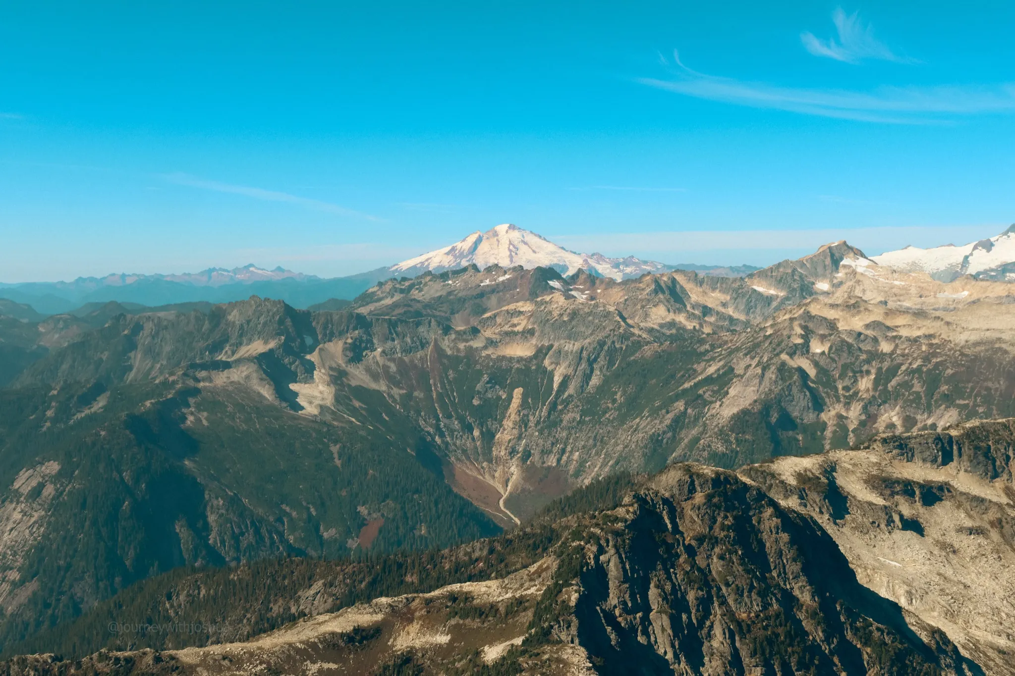 One last look at Mount Baker and the mountain layers from the summit of Mount Triumph