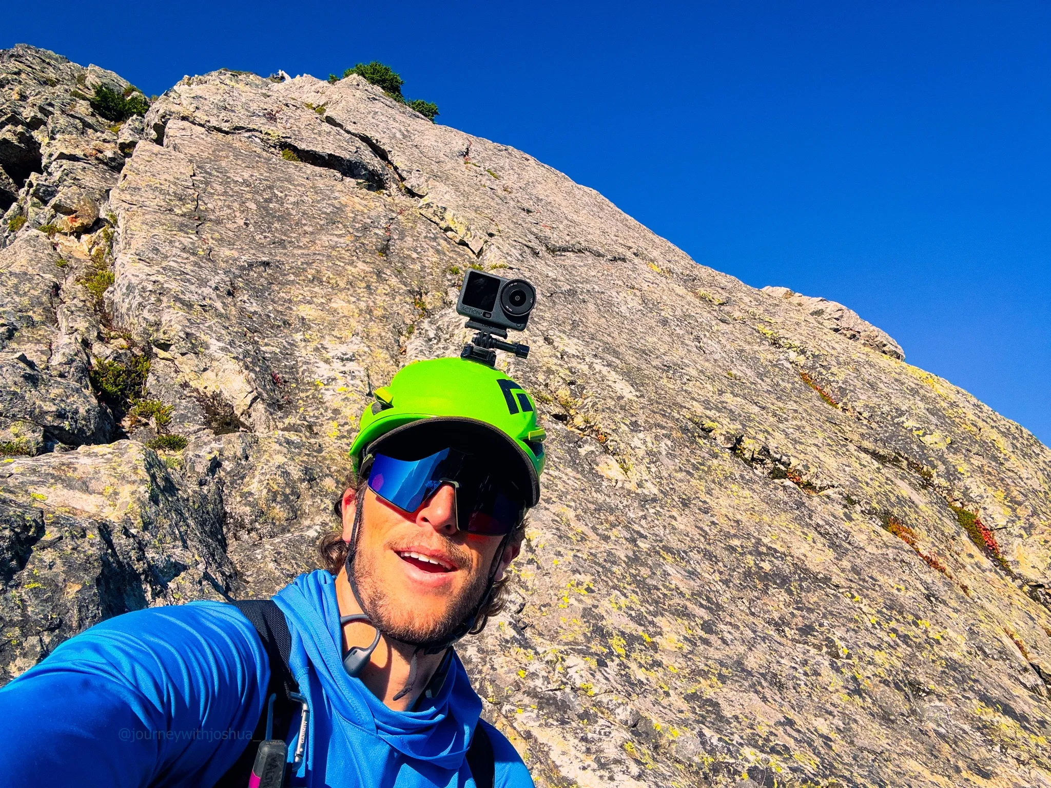 On the Northeast Ridge of Mount Triumph and ready to climb