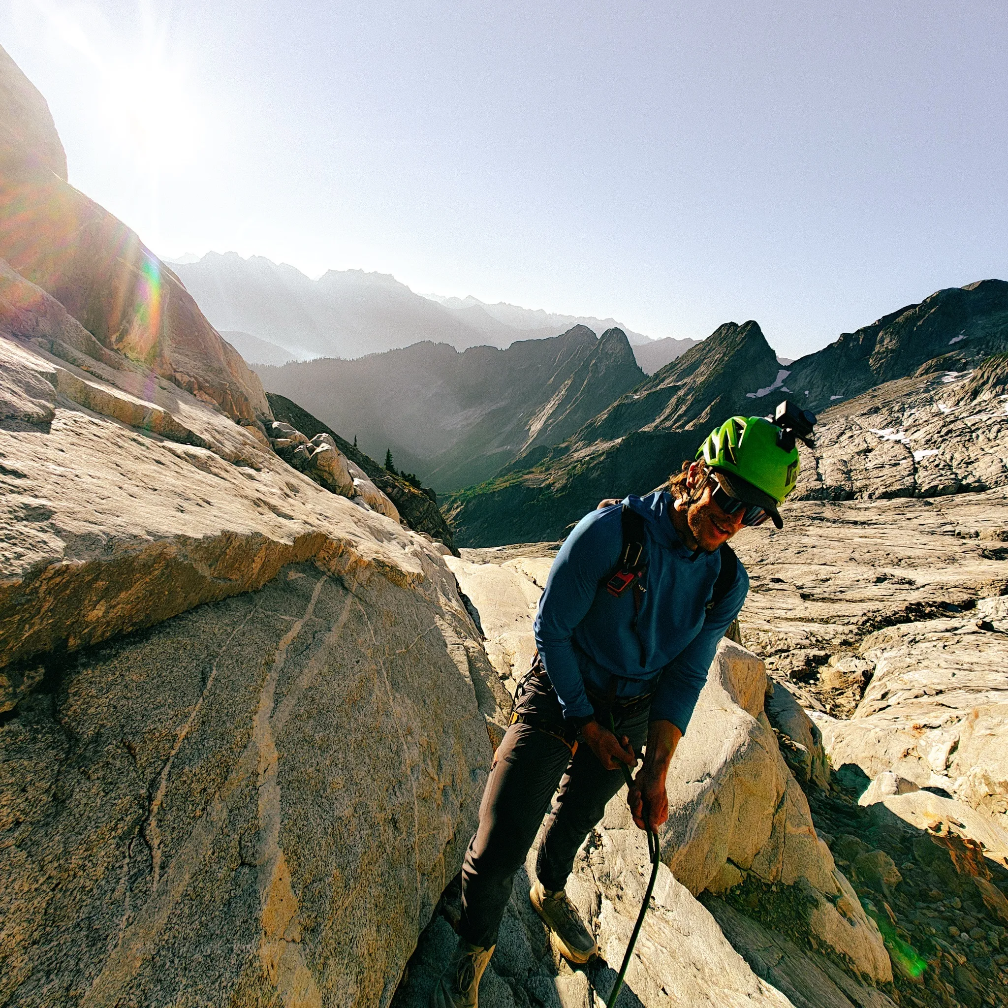 Roping up to pitch out and gain the Northeast Ridge of Mount Triumph